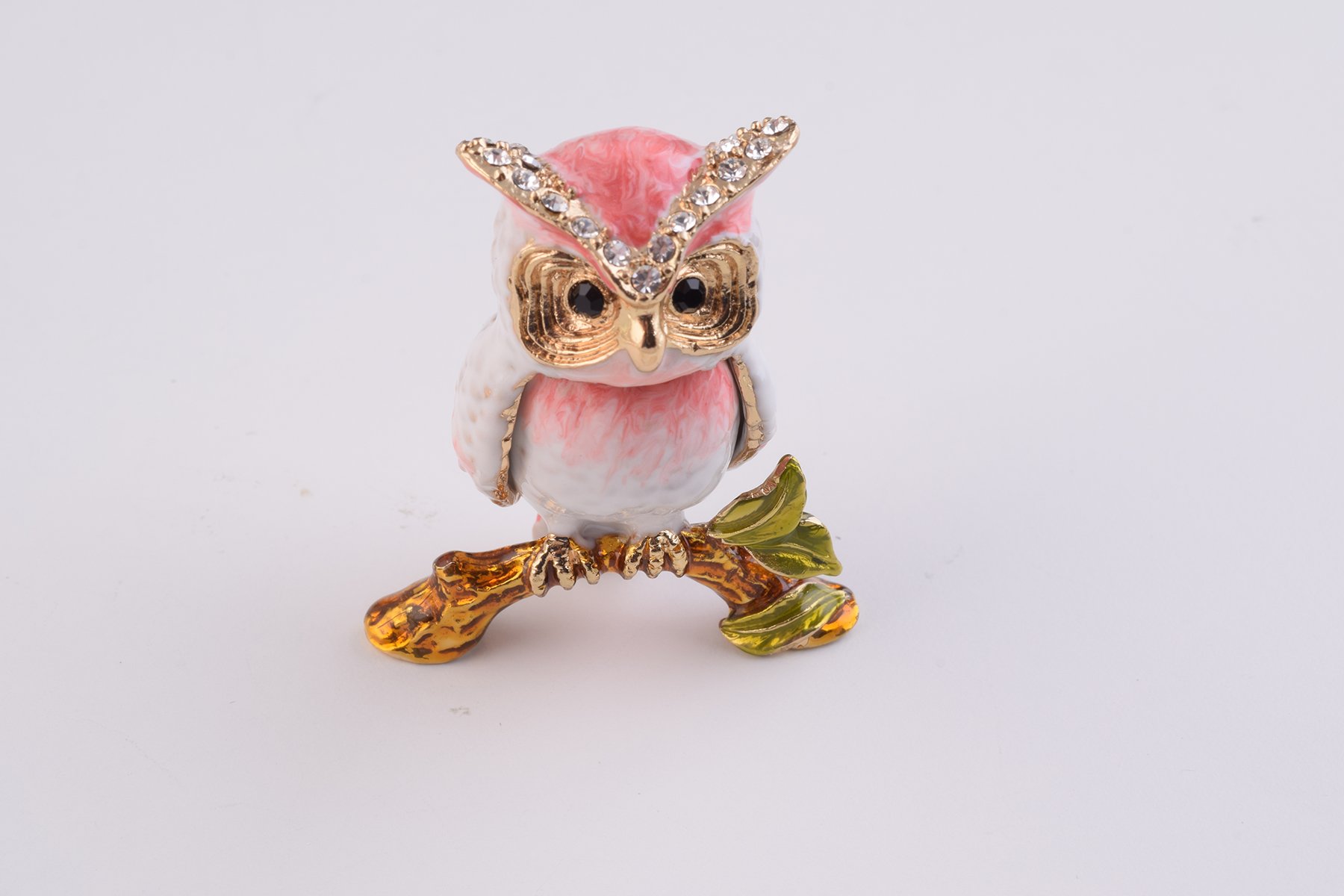 Handcrafted Pink Owl trinket box with Austrian crystals and gold plating, featuring a secure magnetic closure.