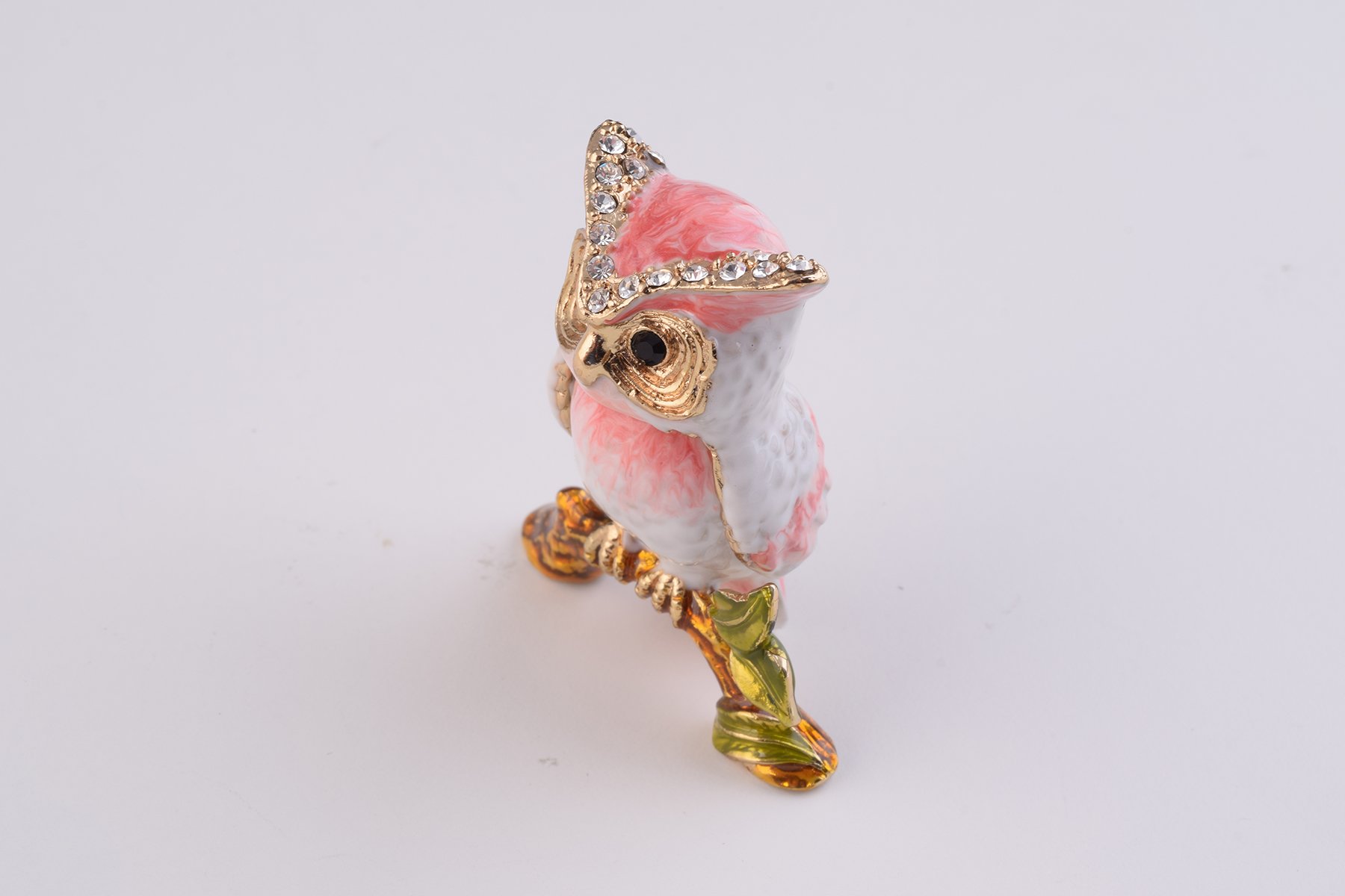 Handcrafted Pink Owl trinket box with Austrian crystals and gold plating, featuring a secure magnetic closure.
