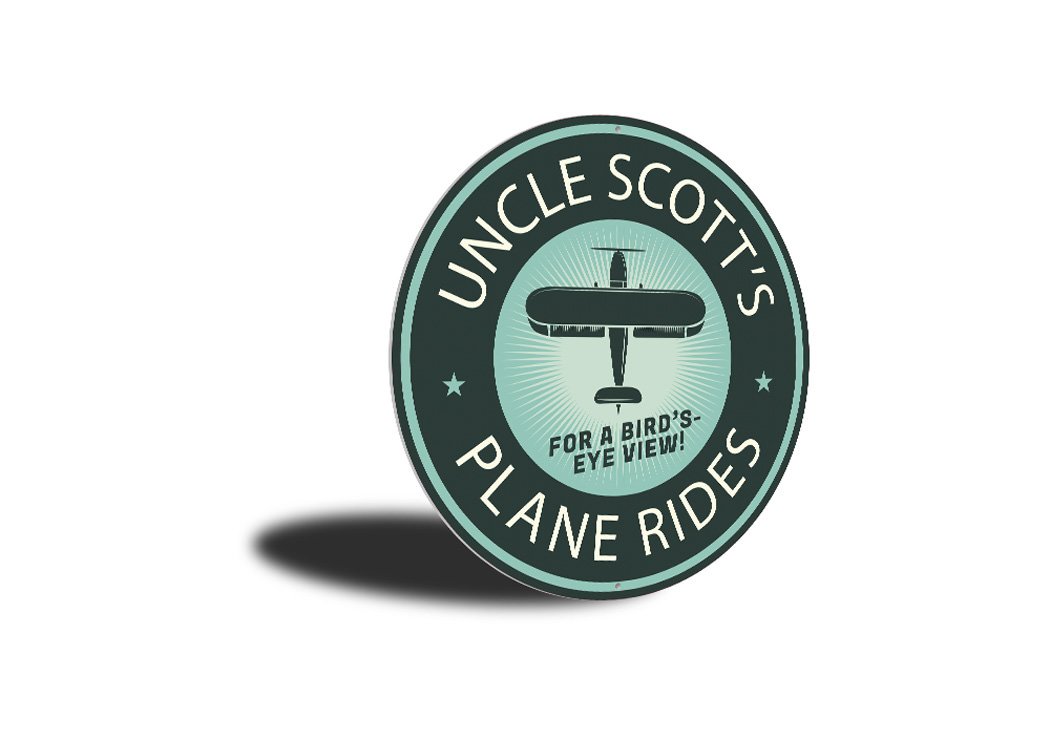 Plane Rides Bird's Eye View Hangar Sign made of aluminum, featuring a decorative aviation design, perfect for home or garage decor.