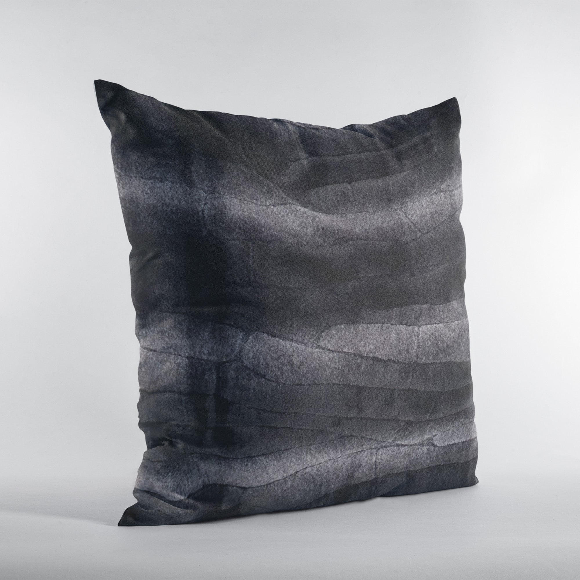Plutus Black Graphite Faux Fur Luxury Throw Pillow showcasing its plush texture and elegant design.