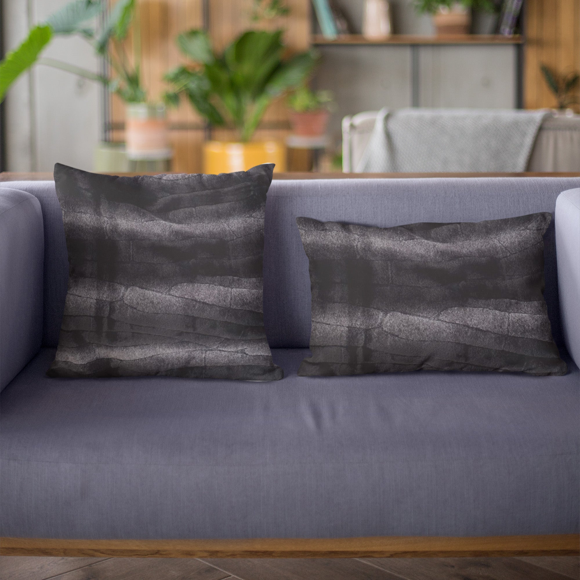 Plutus Black Graphite Faux Fur Luxury Throw Pillow showcasing its plush texture and elegant design.