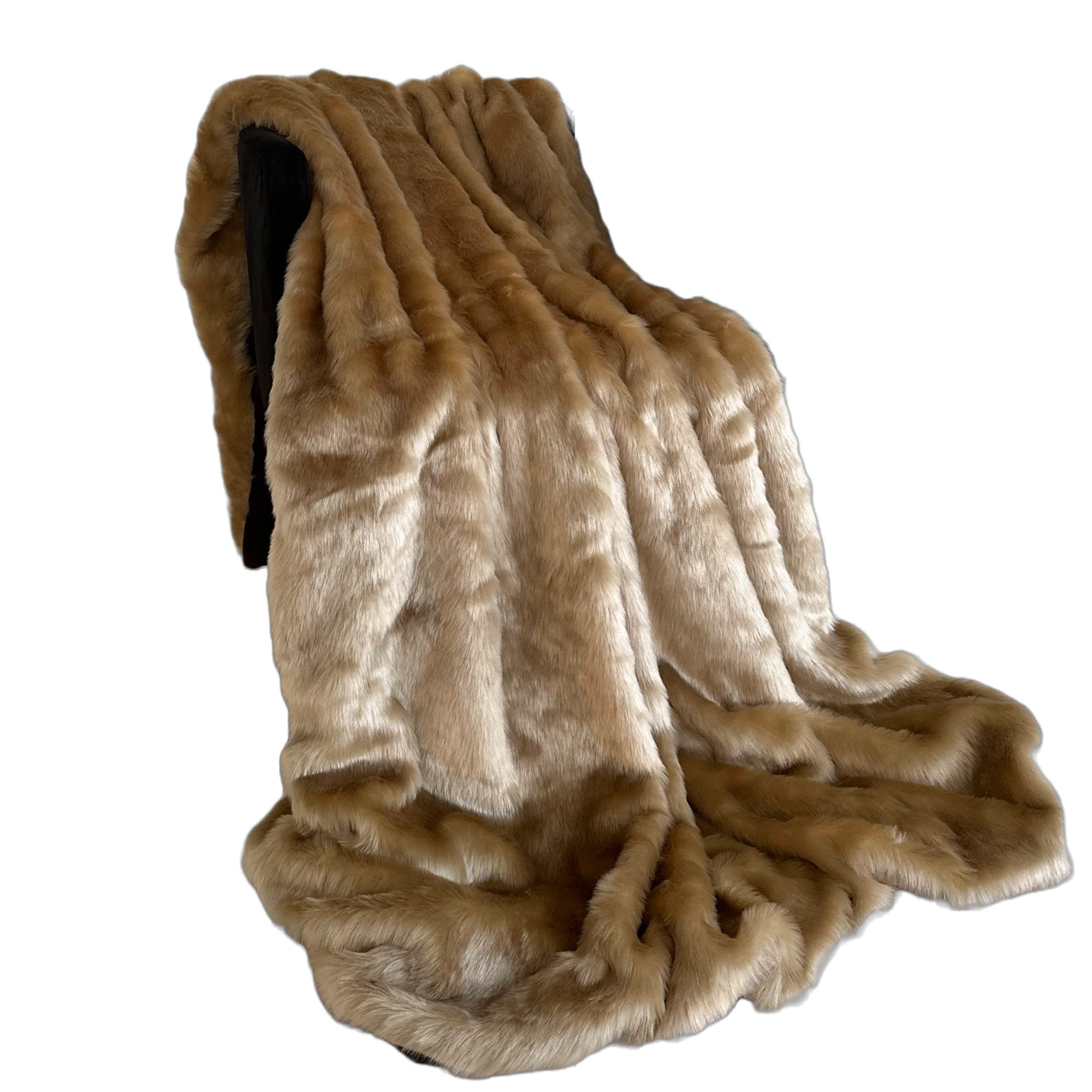 Plutus Brown Gold Rabbit Faux Fur Luxury Throw Blanket draped elegantly on a couch, showcasing its plush texture and rich color.