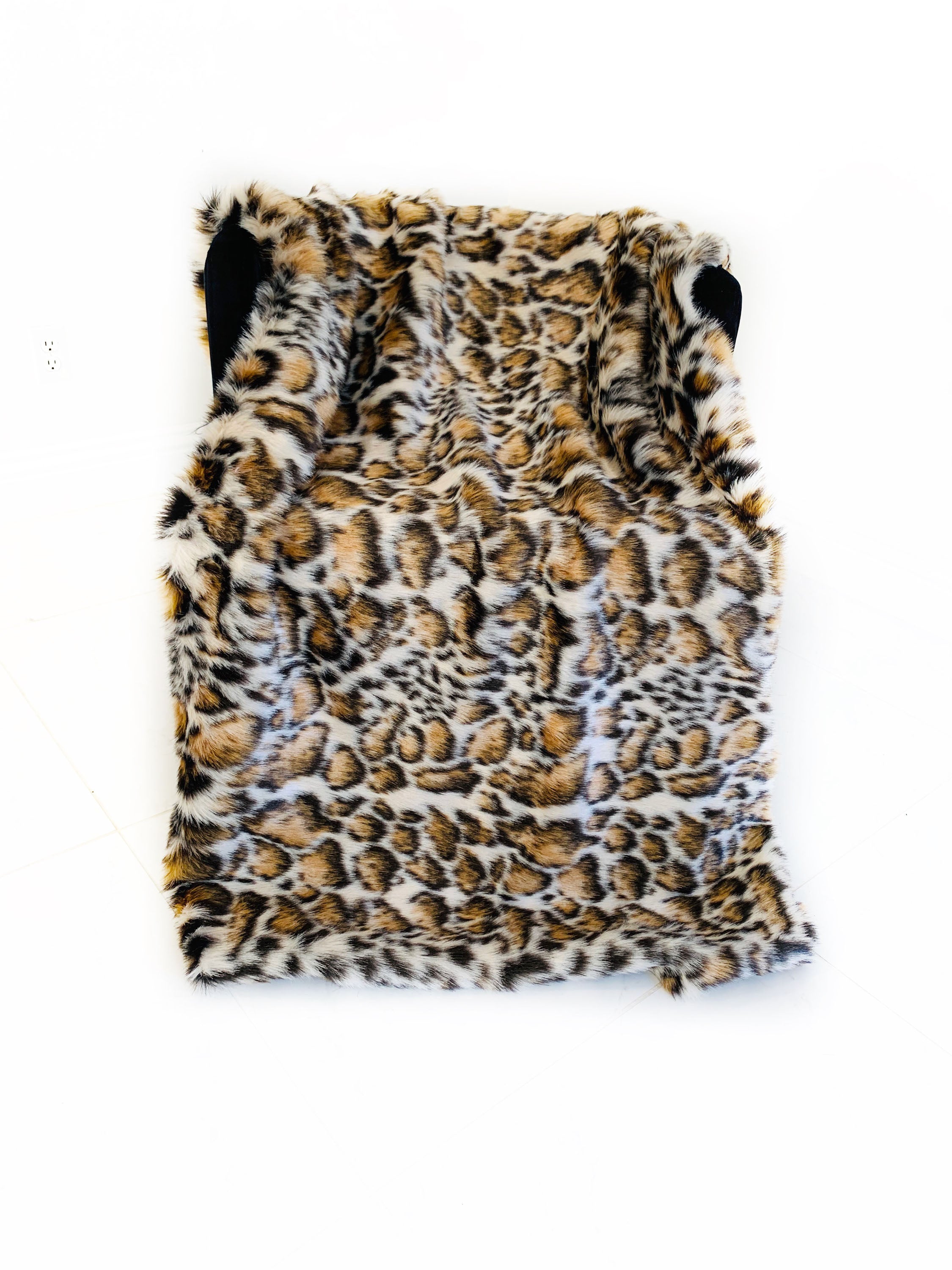 Plutus Brown Tiger Faux Fur Luxury Throw Blanket featuring a taupe and black tiger print, showcasing its plush texture and reversible design.