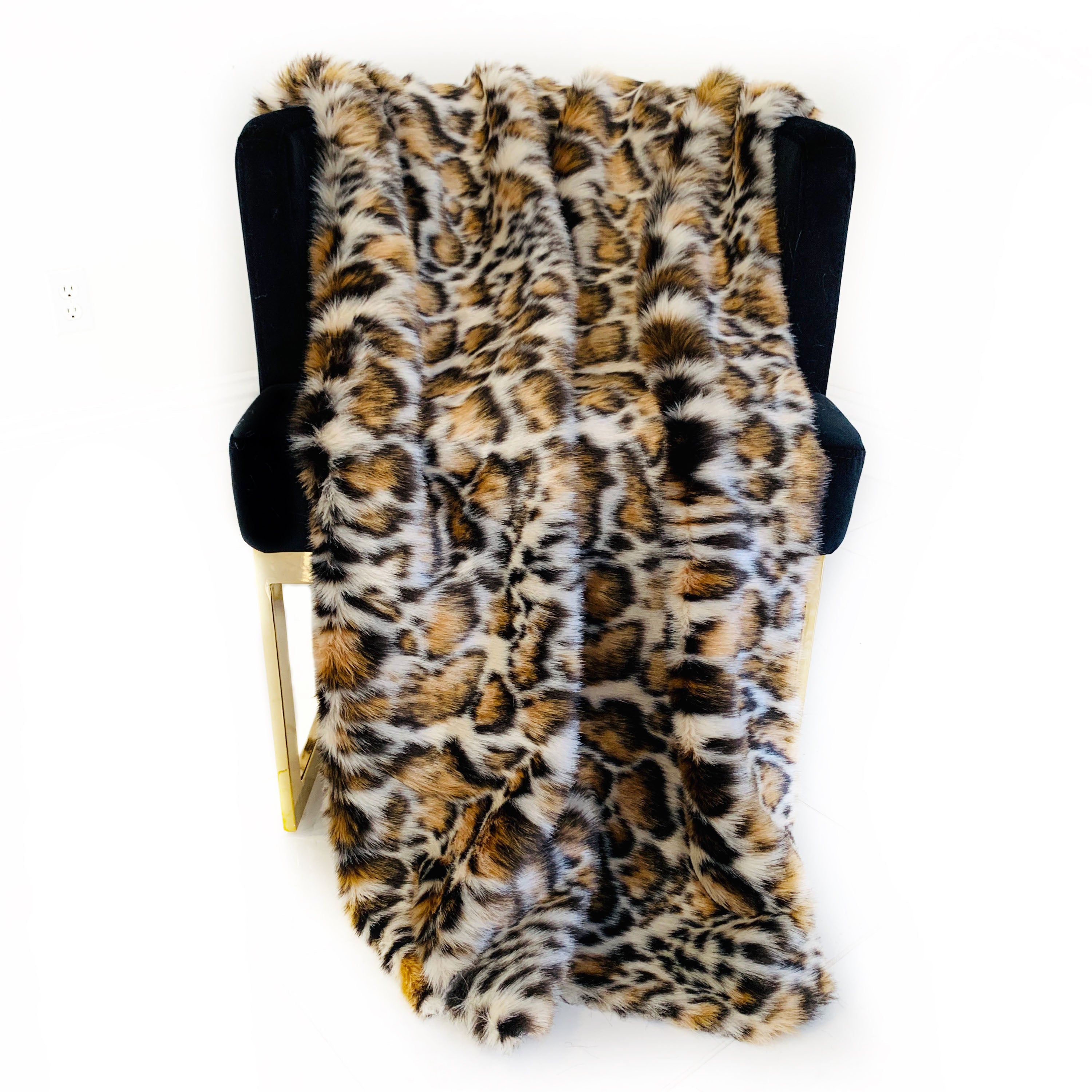 Plutus Brown Tiger Faux Fur Luxury Throw Blanket featuring a taupe and black tiger print, showcasing its plush texture and reversible design.