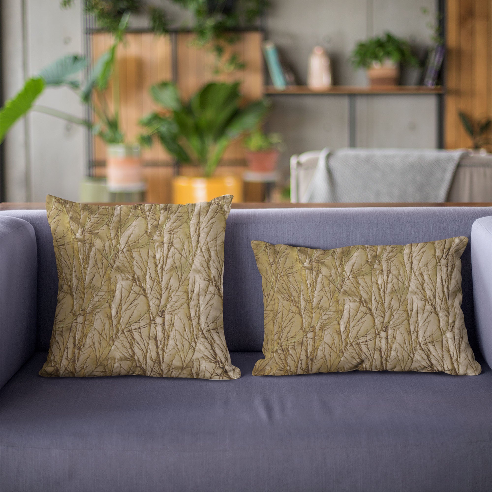 Plutus Burnished Bronze Yarns Luxury Pillow with a shiny twig pattern, showcasing its elegant design and rich texture.