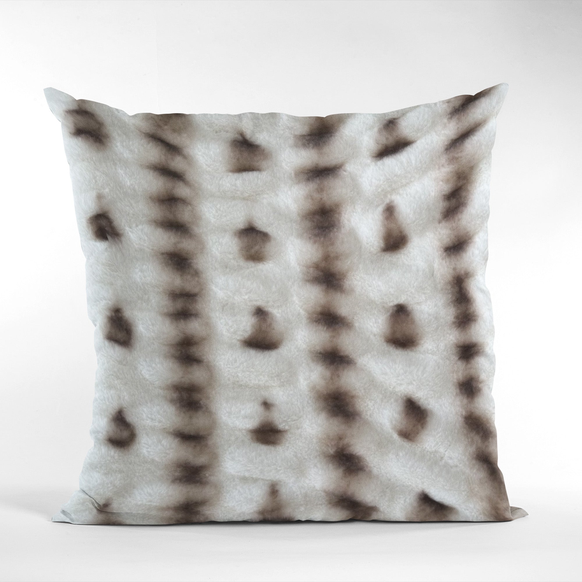 Plutus Creamy Fluffy Bunni Faux Fur Luxury Throw Pillow showcasing its soft texture and elegant design.