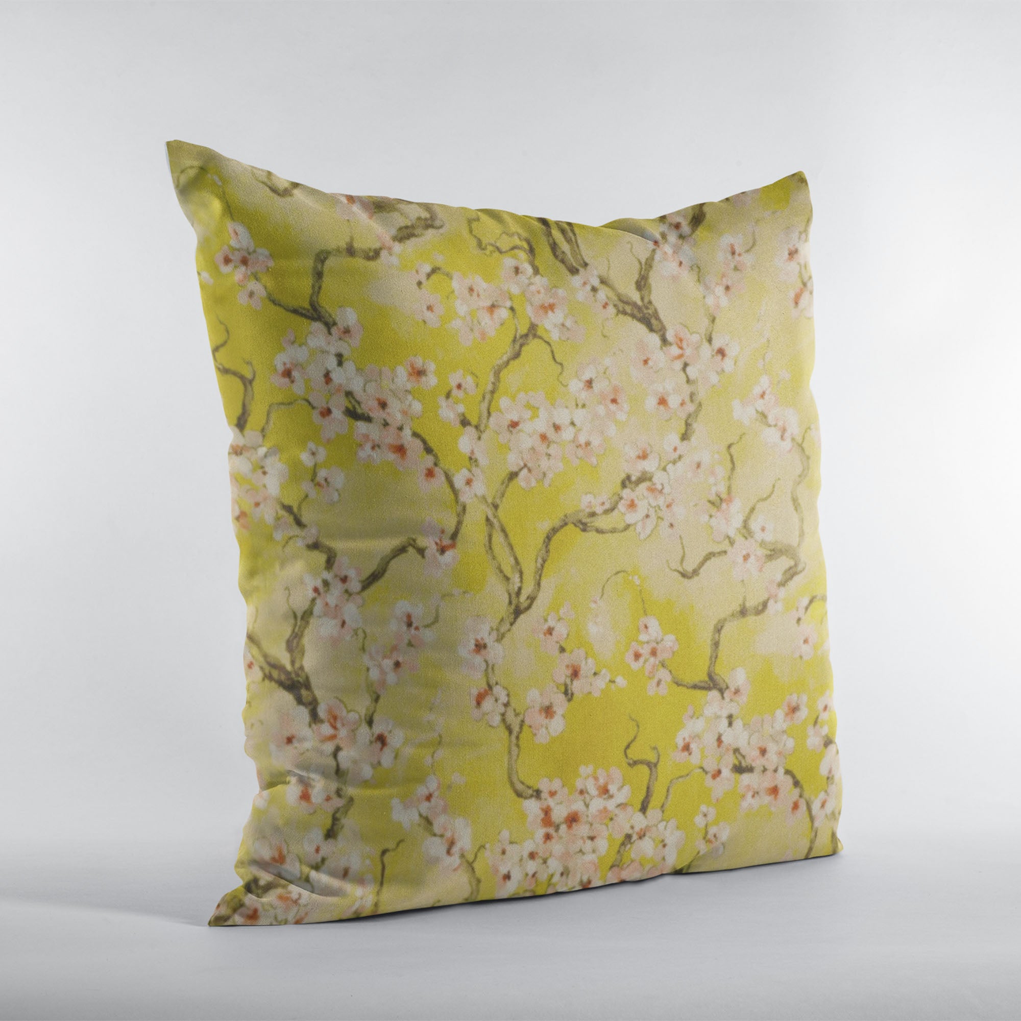 Plutus Curry Garden throw pillow featuring cherry blossoms on a linen-like polyester fabric, showcasing vibrant colors and elegant design.
