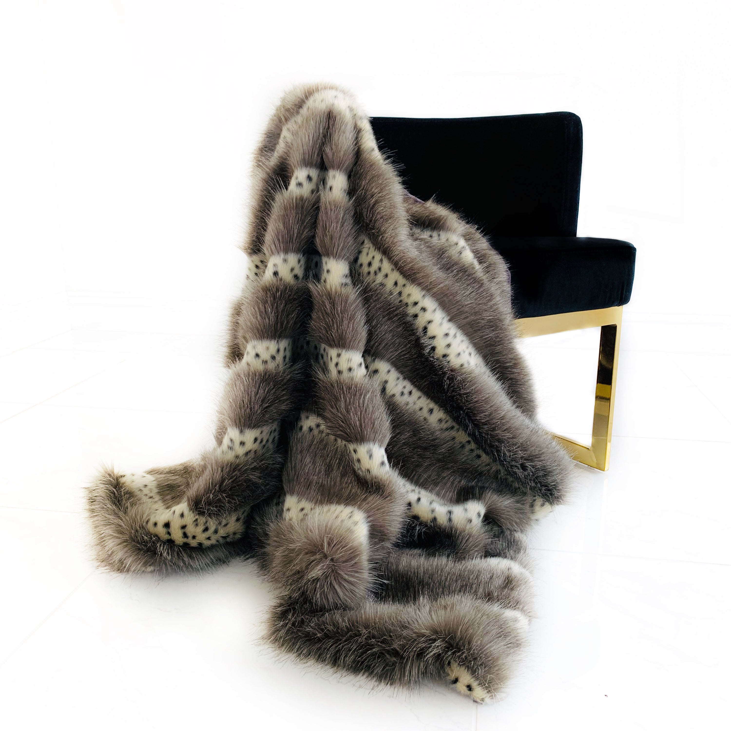 Plutus Gray Two Tone Feather Faux Fur Luxury Throw Blanket in taupe and black, showcasing its plush texture and reversible design.