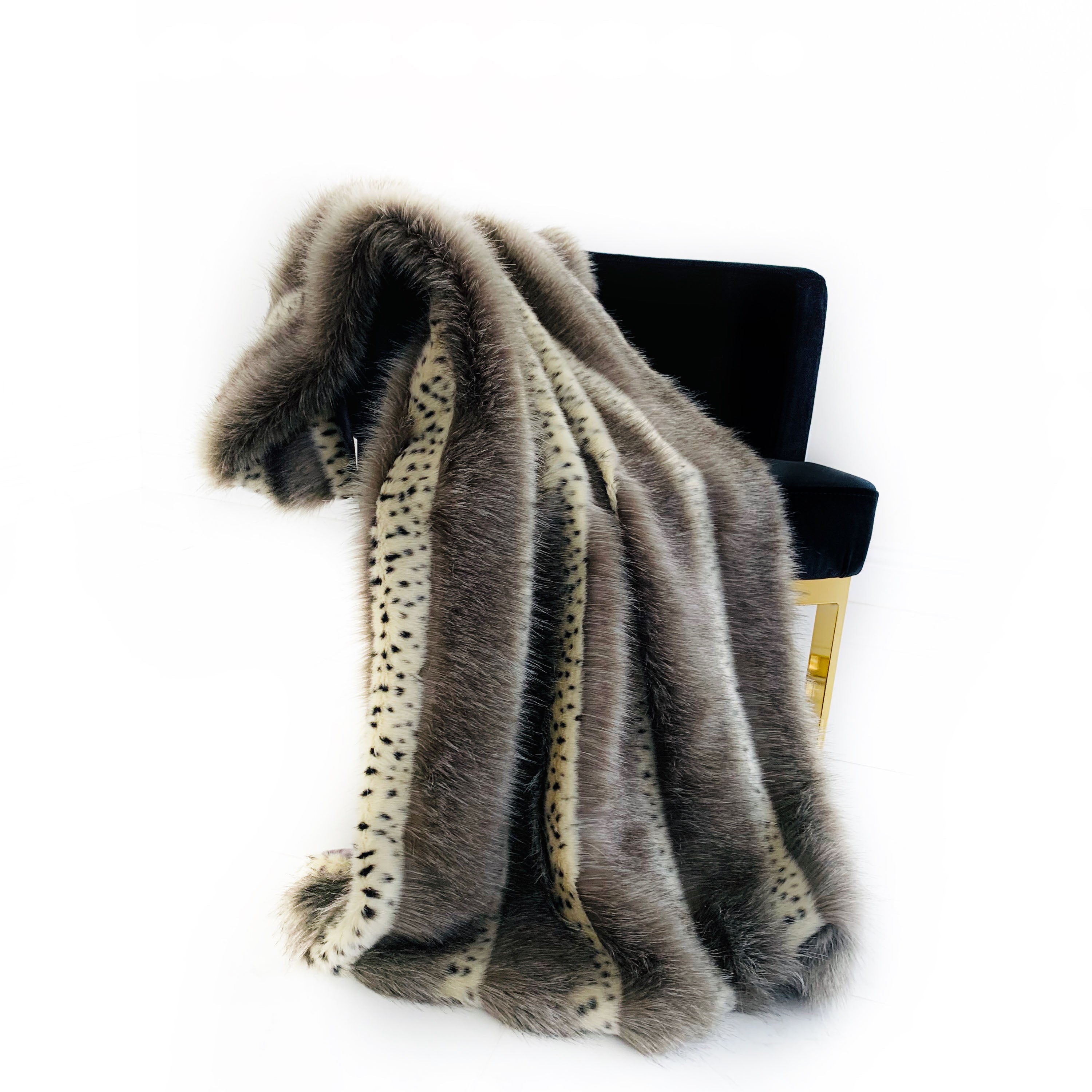 Plutus Gray Two Tone Feather Faux Fur Luxury Throw Blanket in taupe and black, showcasing its plush texture and reversible design.