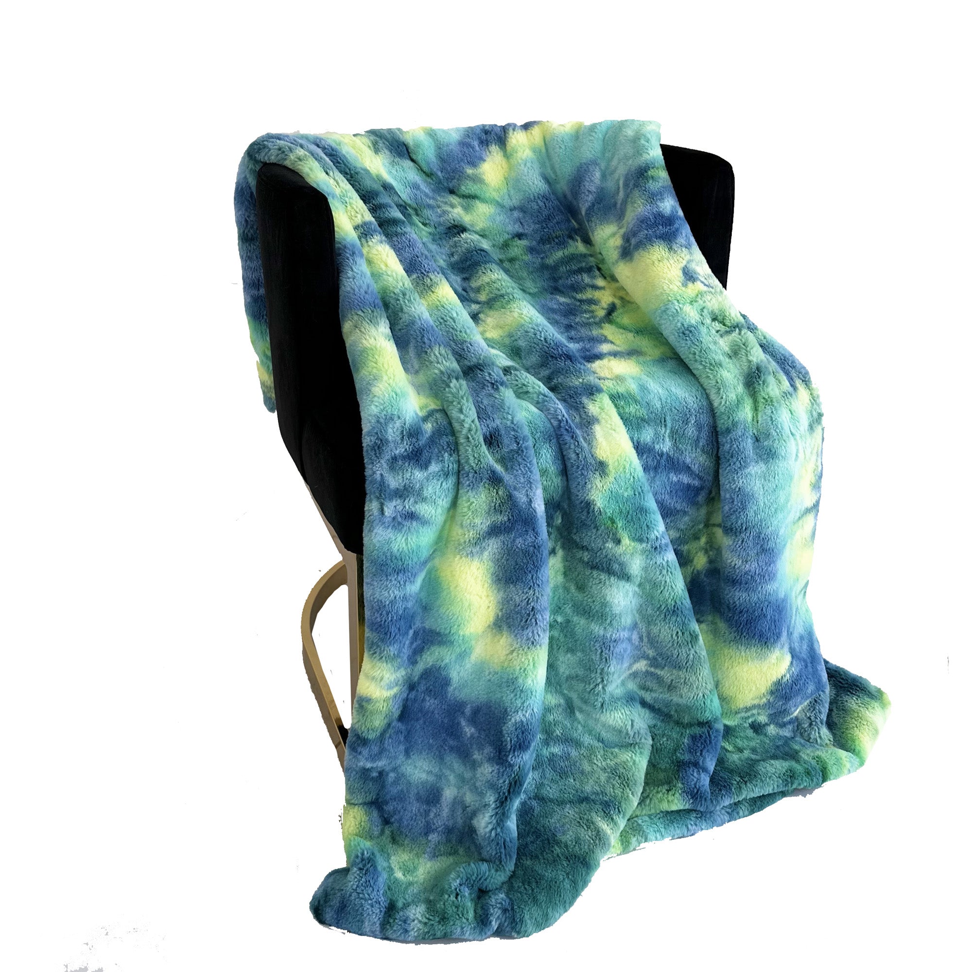 Plutus Green Yellow Blue Northern Lights Faux Fur Luxury Throw Blanket draped elegantly over a couch, showcasing its vibrant colors and plush texture.