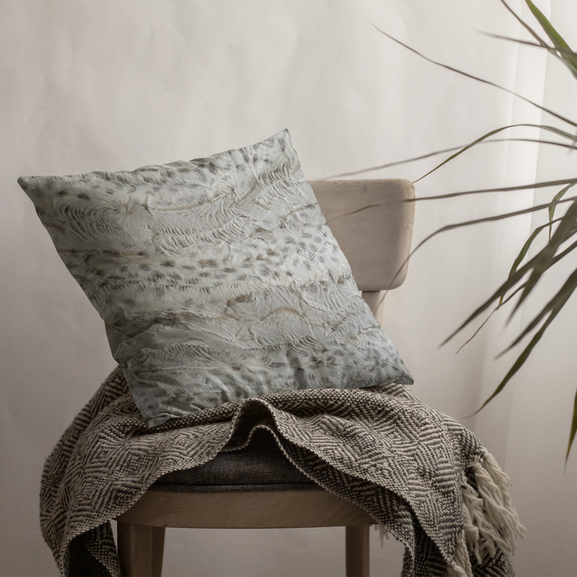 Plutus Taupe Lynx Animal Faux Fur Luxury Throw Pillow showcasing its soft faux fur texture and elegant taupe color.