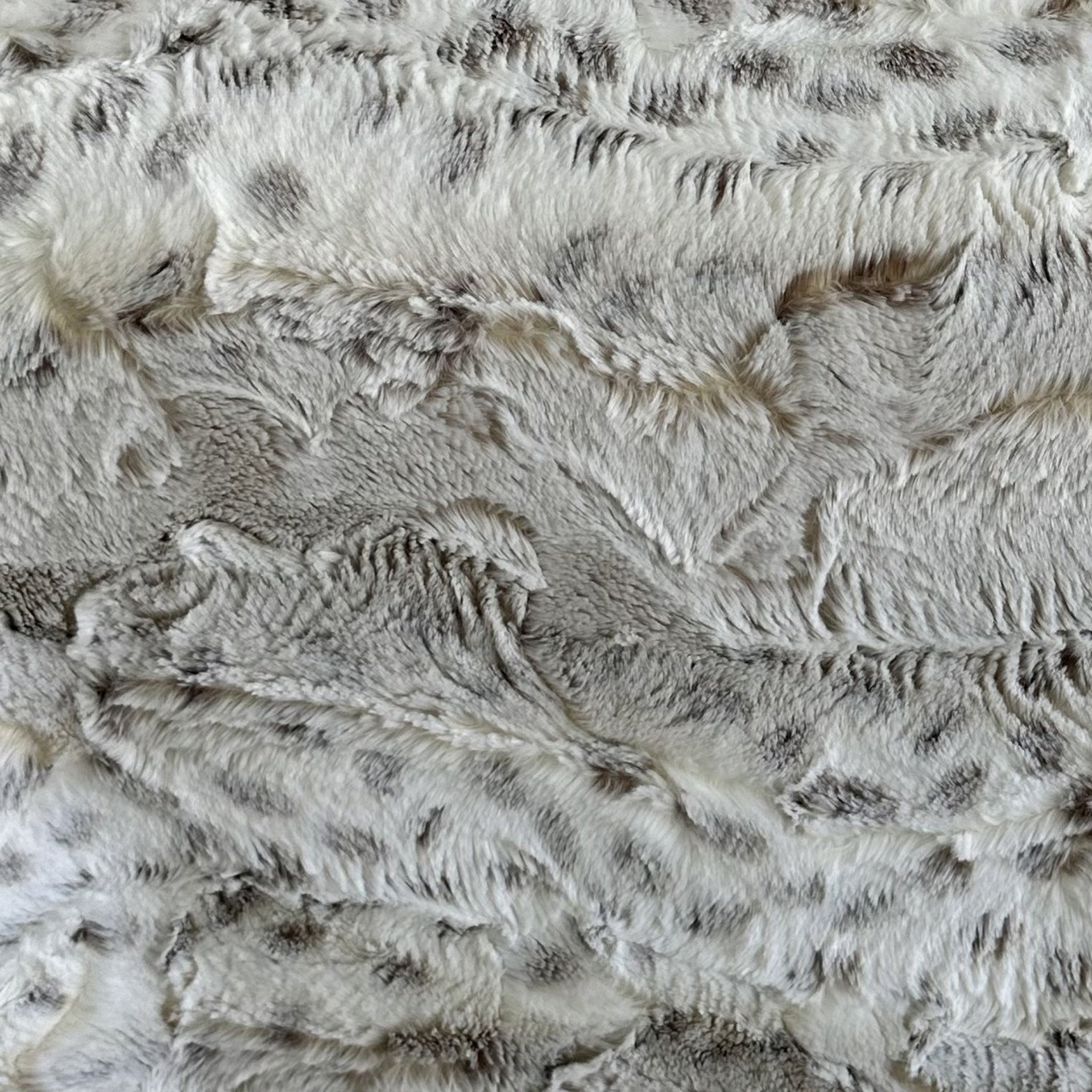Plutus Taupe Lynx Animal Faux Fur Luxury Throw Pillow showcasing its soft faux fur texture and elegant taupe color.