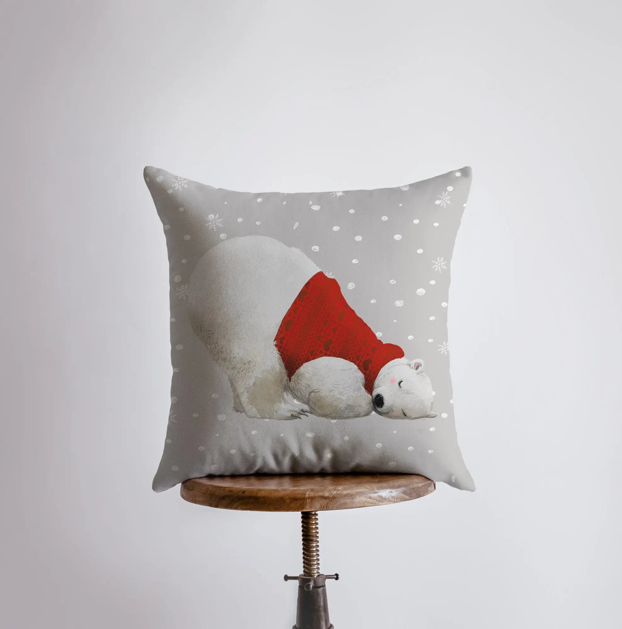 Cozy Polar Bear pillow cover featuring a red sweater and snowflakes, perfect for winter home decor.