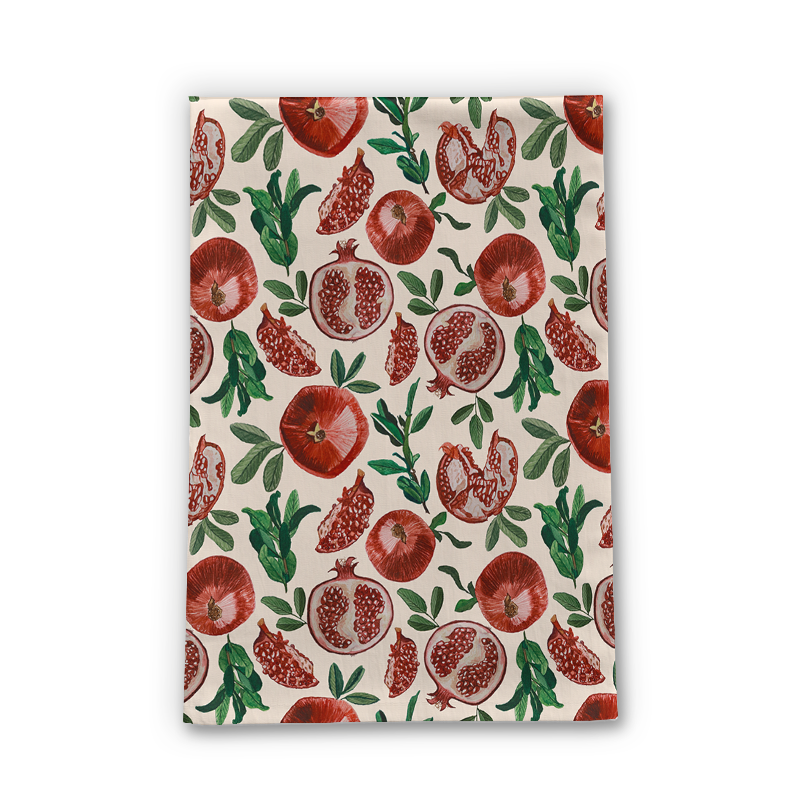 A vibrant pomegranate tea towel made of cotton twill, featuring a colorful pomegranate design, perfect for kitchen use.