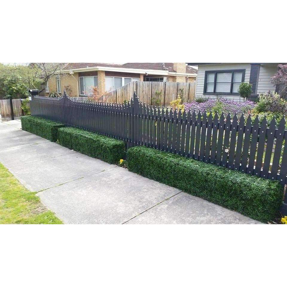 Portable Artificial Boxwood Hedge measuring 75cm x 75cm, UV resistant, perfect for outdoor use, providing instant greenery and privacy.