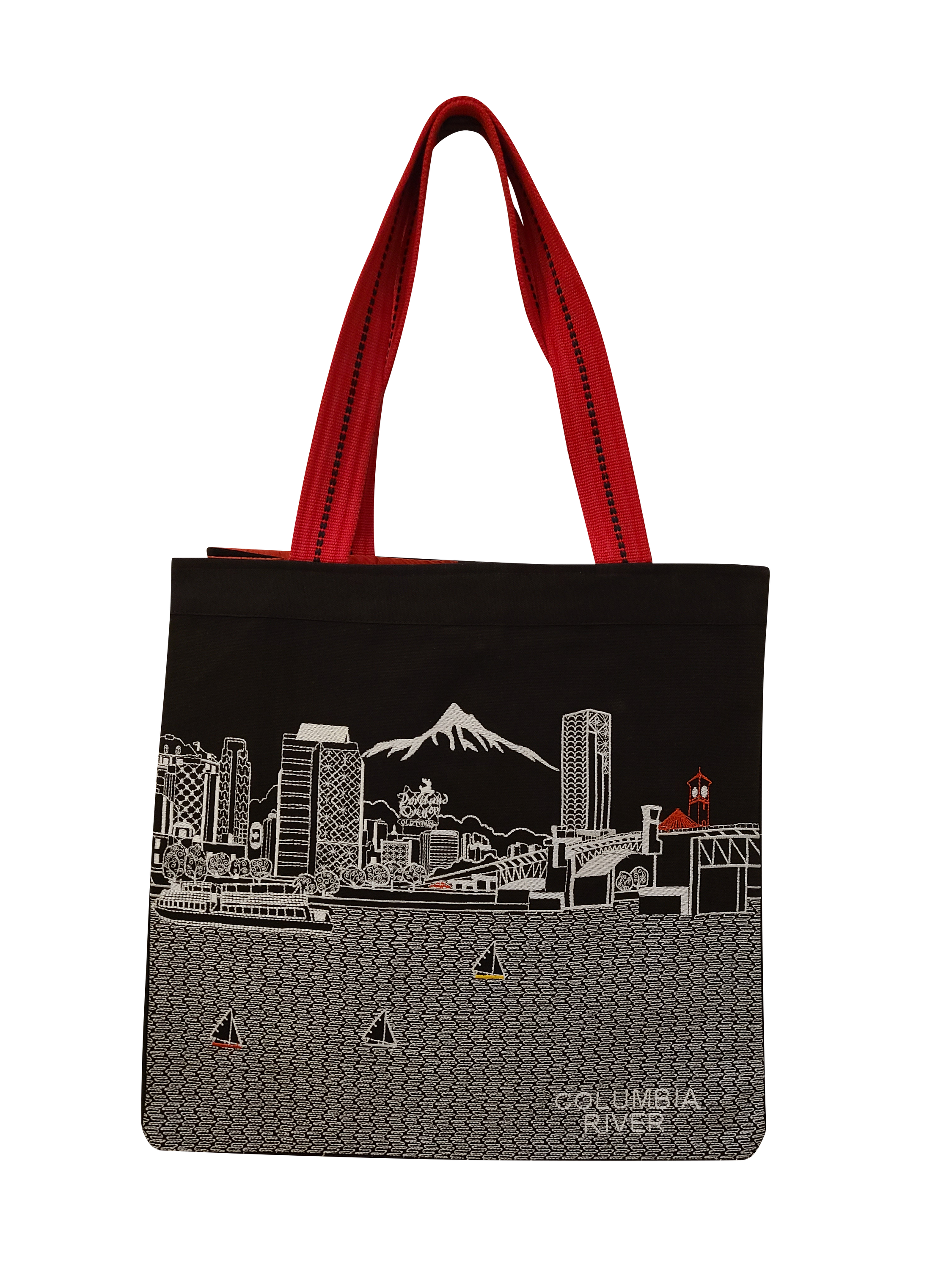 Portland Tote Bag featuring embroidered skyline design on cream and black cotton canvas with red straps.