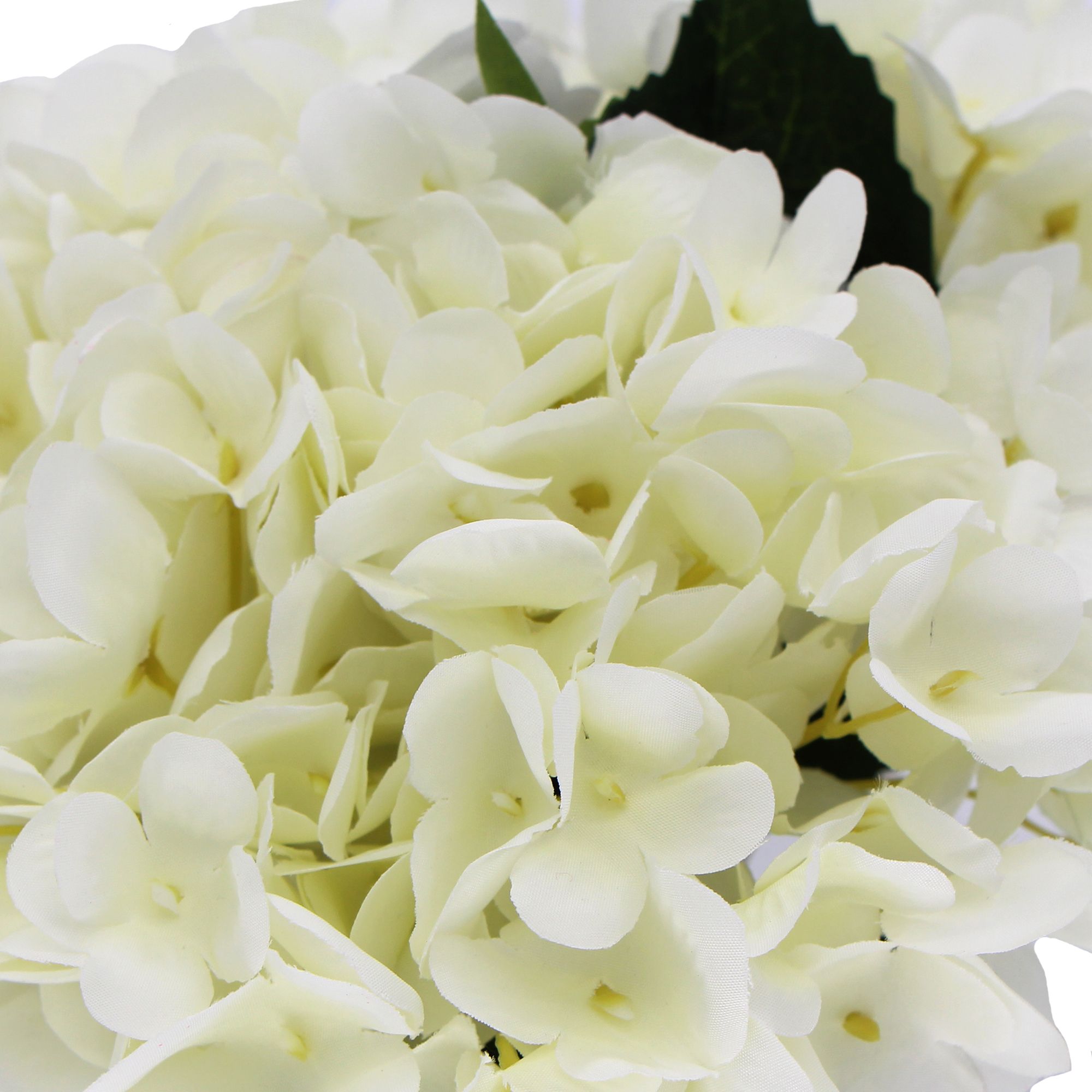 Premium faux hydrangea with delicate white petals arranged in a modern glass vase, perfect for home decor.