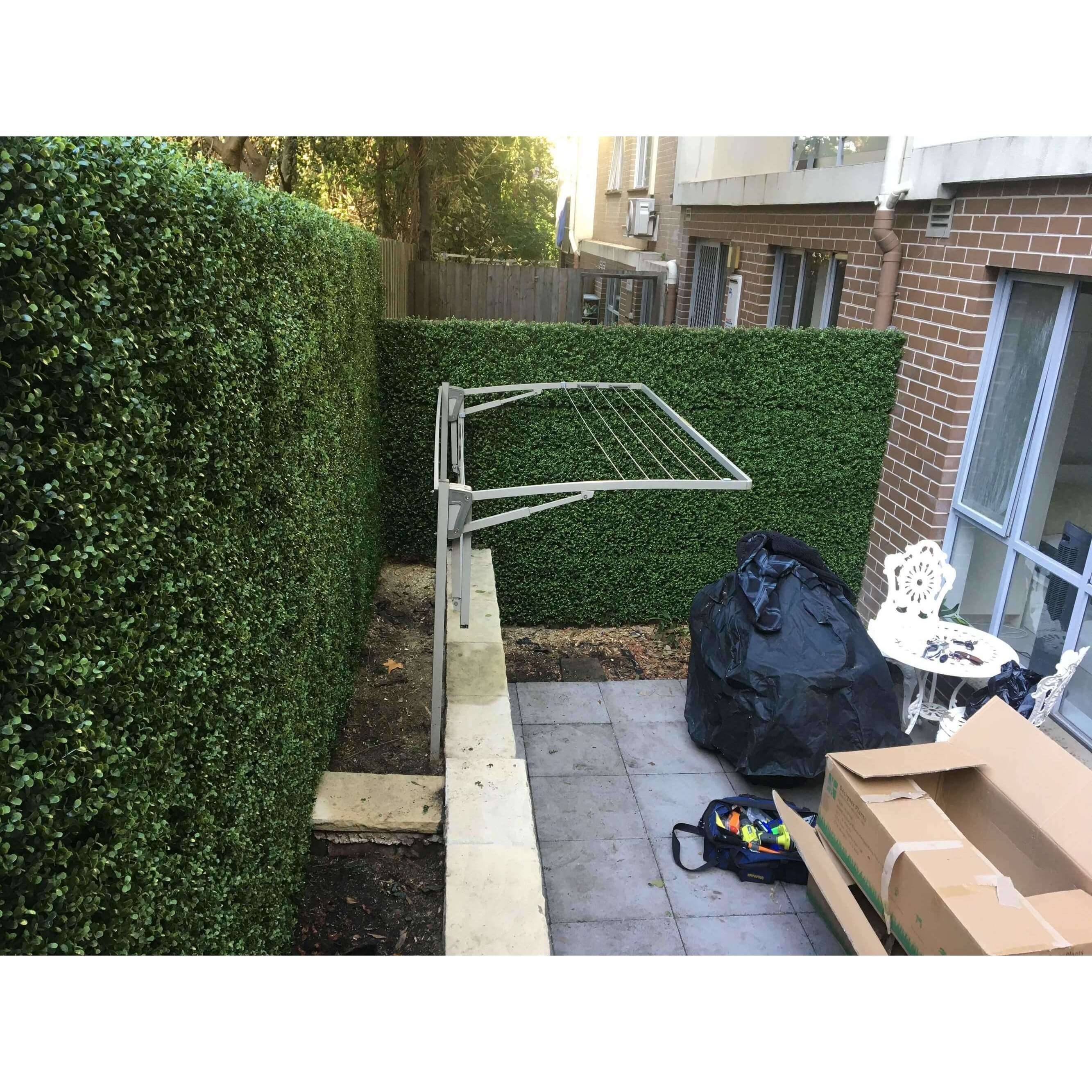 Premium Natural Buxus Artificial Hedge Panel, 1m x 1m, showcasing realistic green foliage for outdoor privacy and aesthetics.