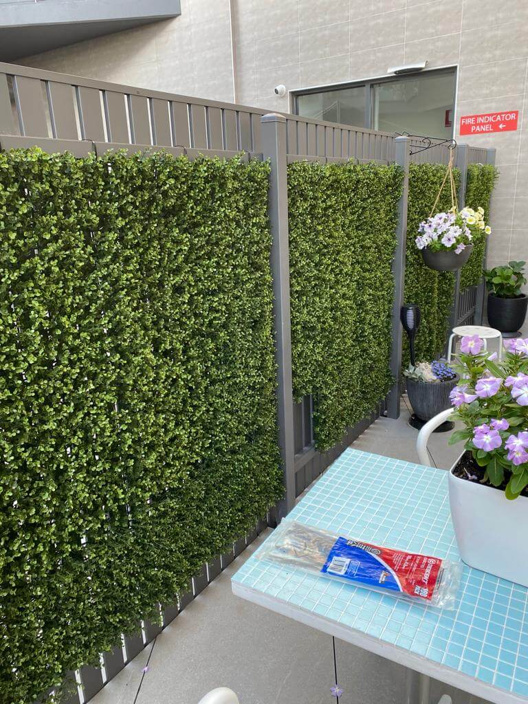 Premium Natural Buxus Artificial Hedge Panel, 1m x 1m, showcasing realistic green foliage for outdoor privacy and aesthetics.