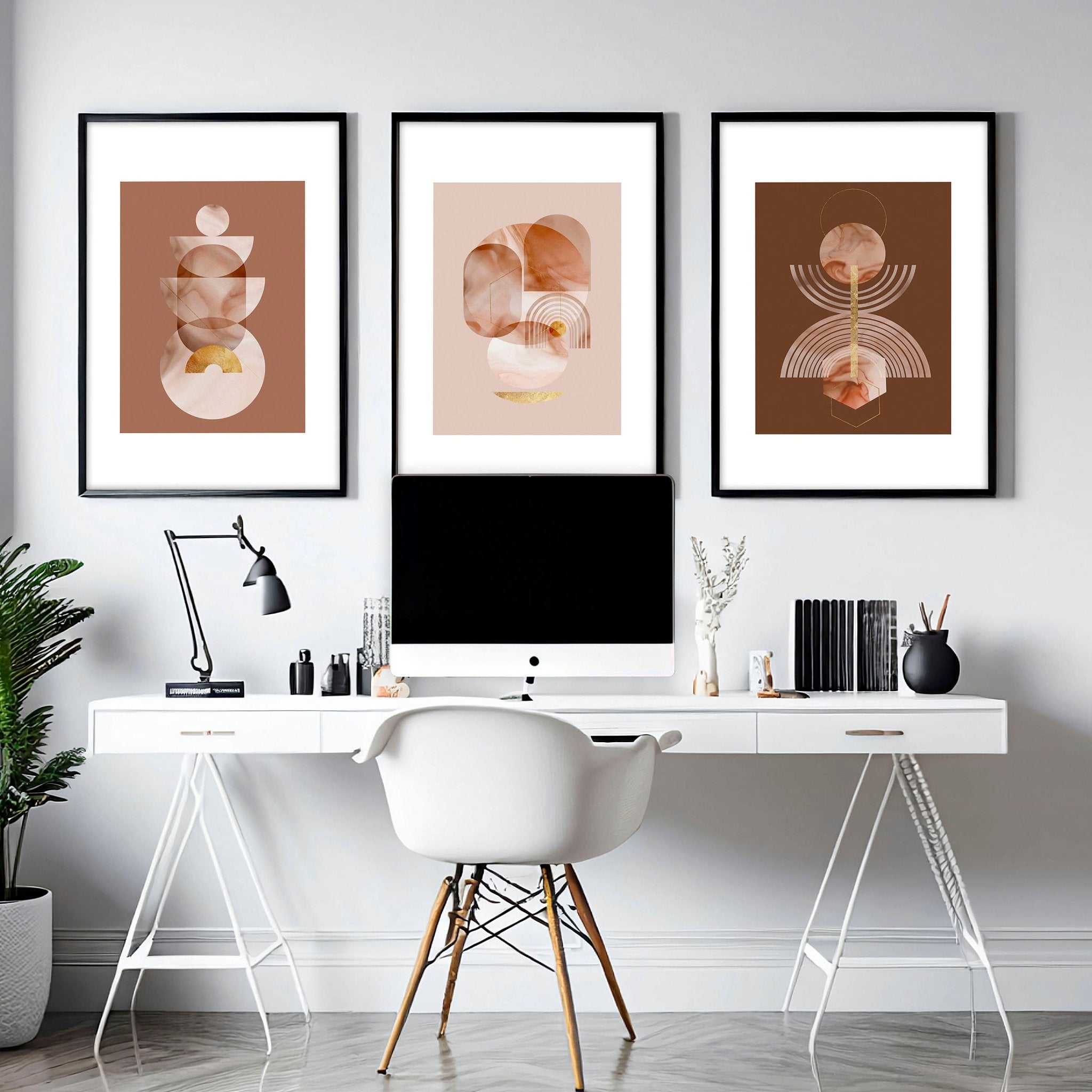 Set of 3 framed wall art prints featuring mid-century designs in Terracotta, Peach, and Muted Gold colors, perfect for office decor.