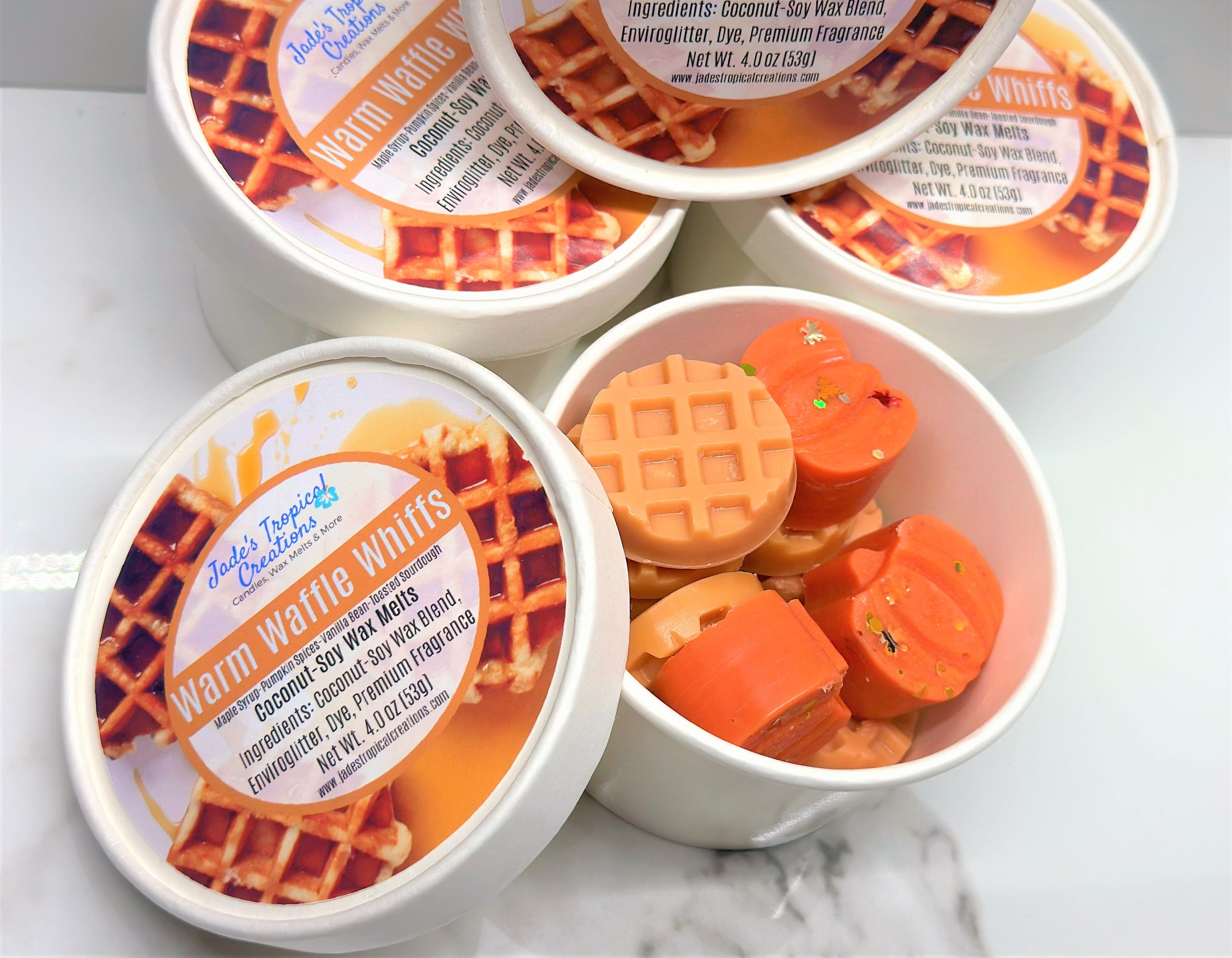Pumpkin Waffle Wax Melts in a decorative dish, showcasing their rich, warm colors and inviting aroma.