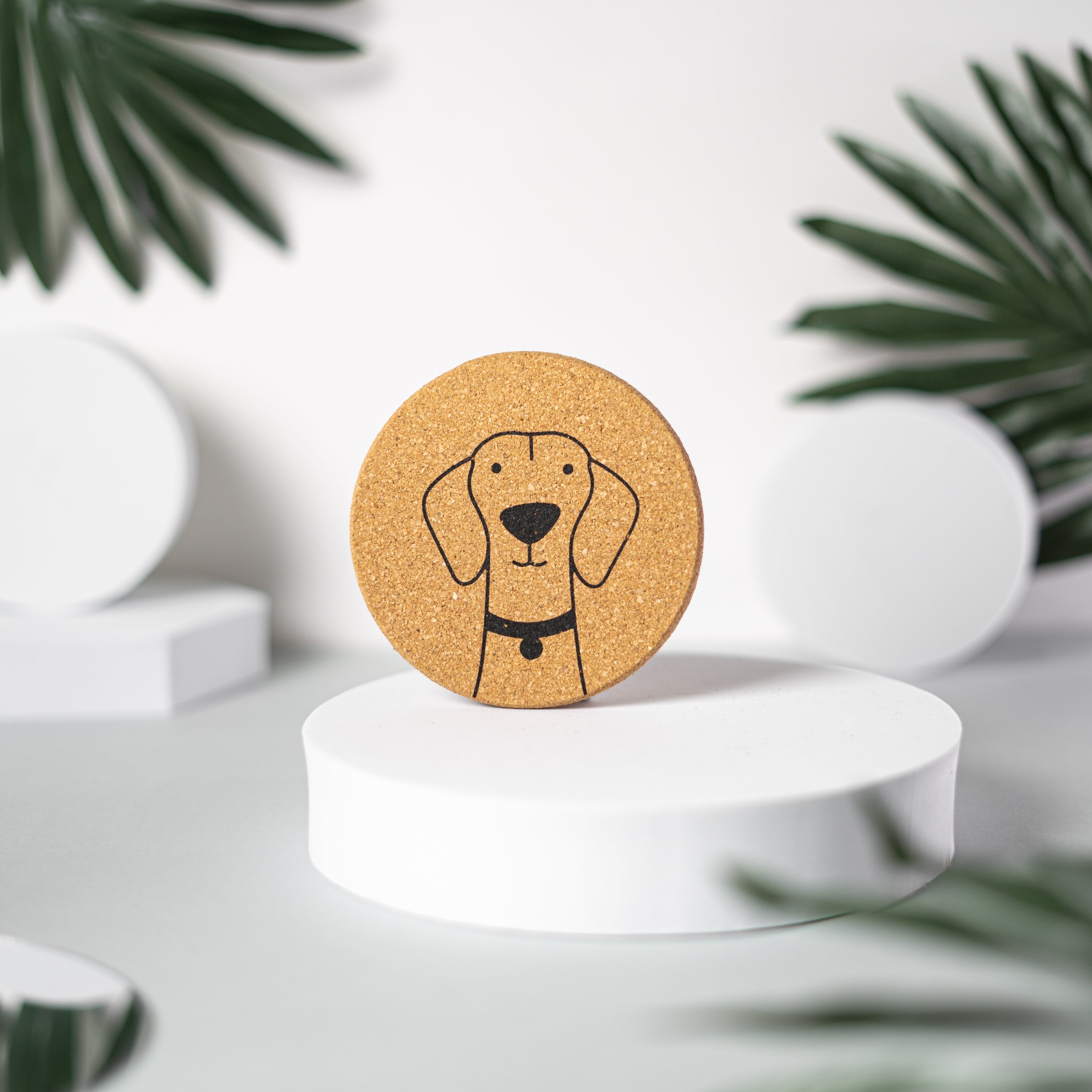 Set of 6 round cork coasters featuring cute dog designs including Saint Bernards, Labrador Retrievers, and more.