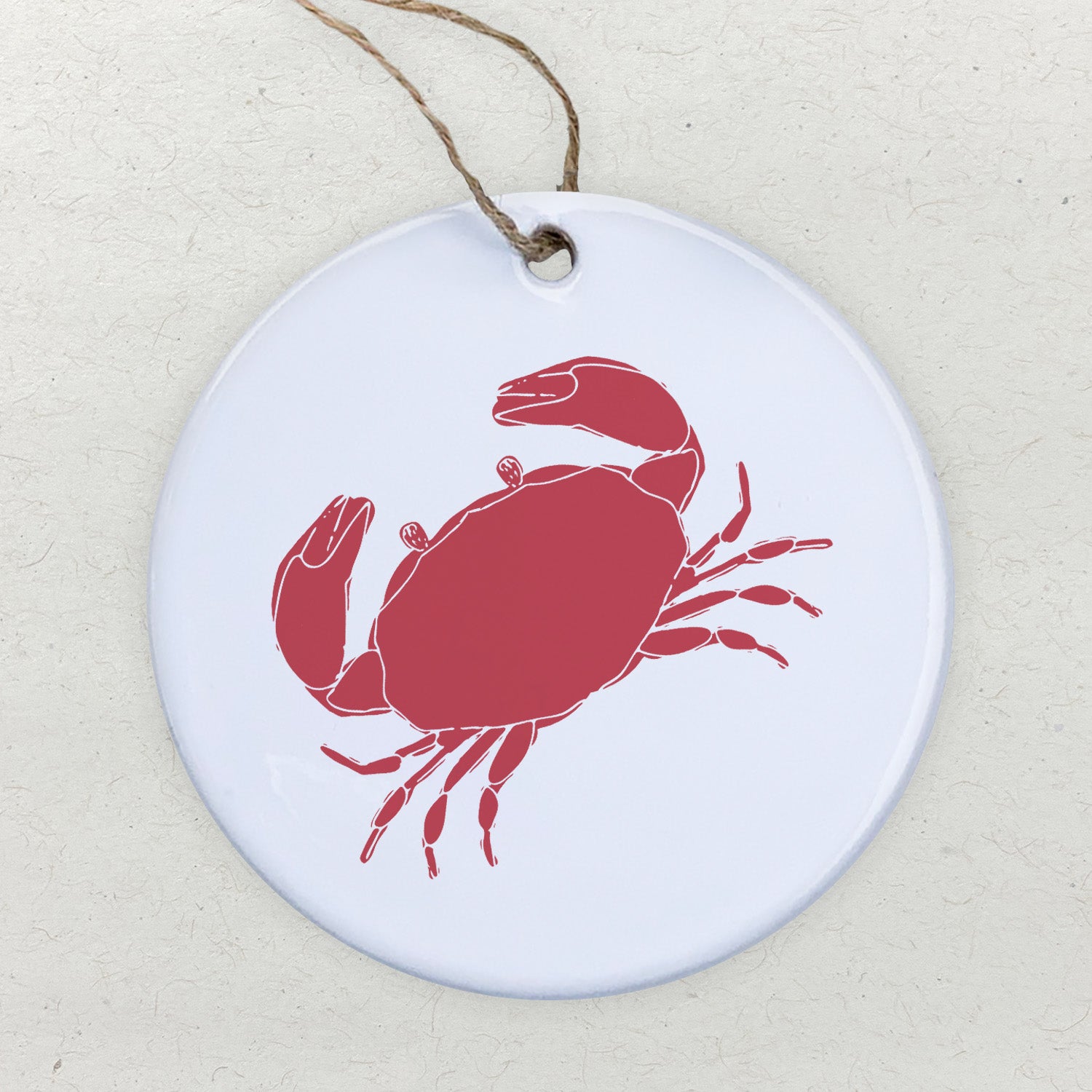 A beautifully crafted Red Crab Ornament made of high-quality porcelain, featuring a vibrant design and smooth gloss finish.