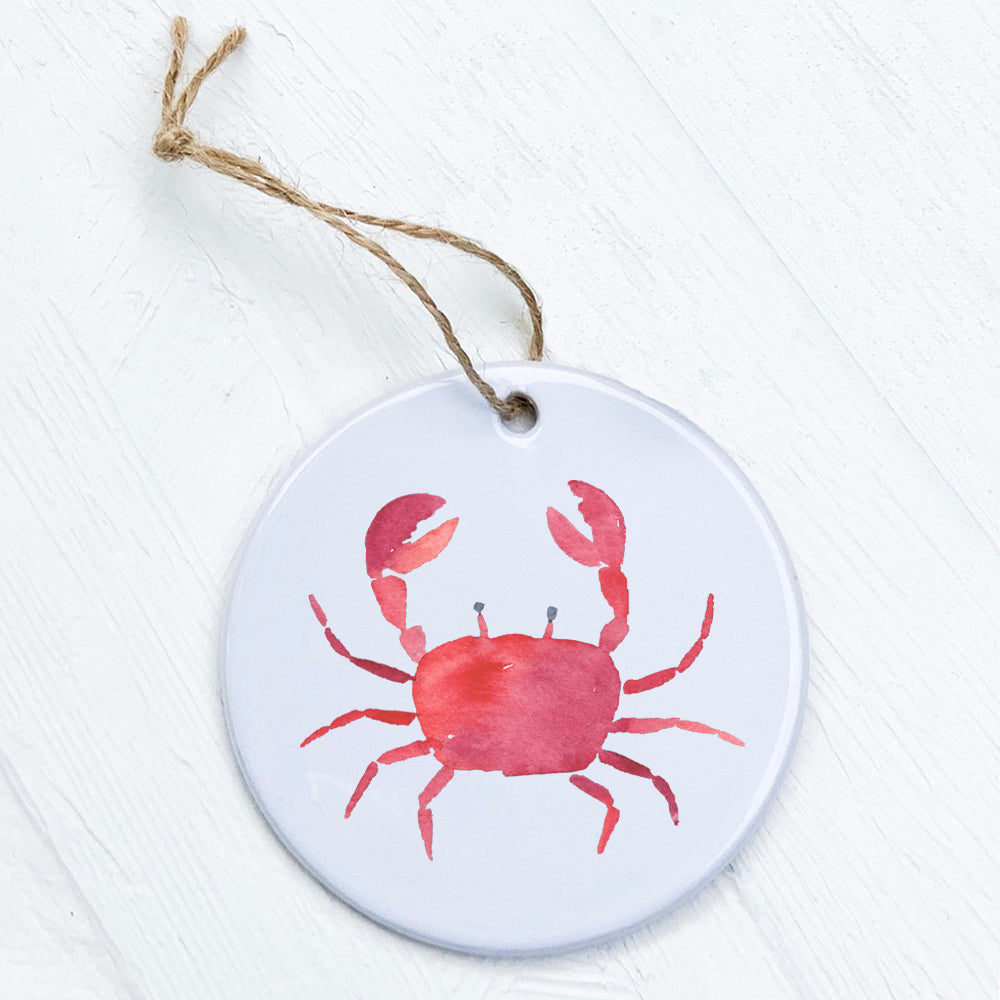 A beautifully crafted Red Crab Ornament made of high-quality porcelain, featuring a vibrant design and smooth glossy finish.