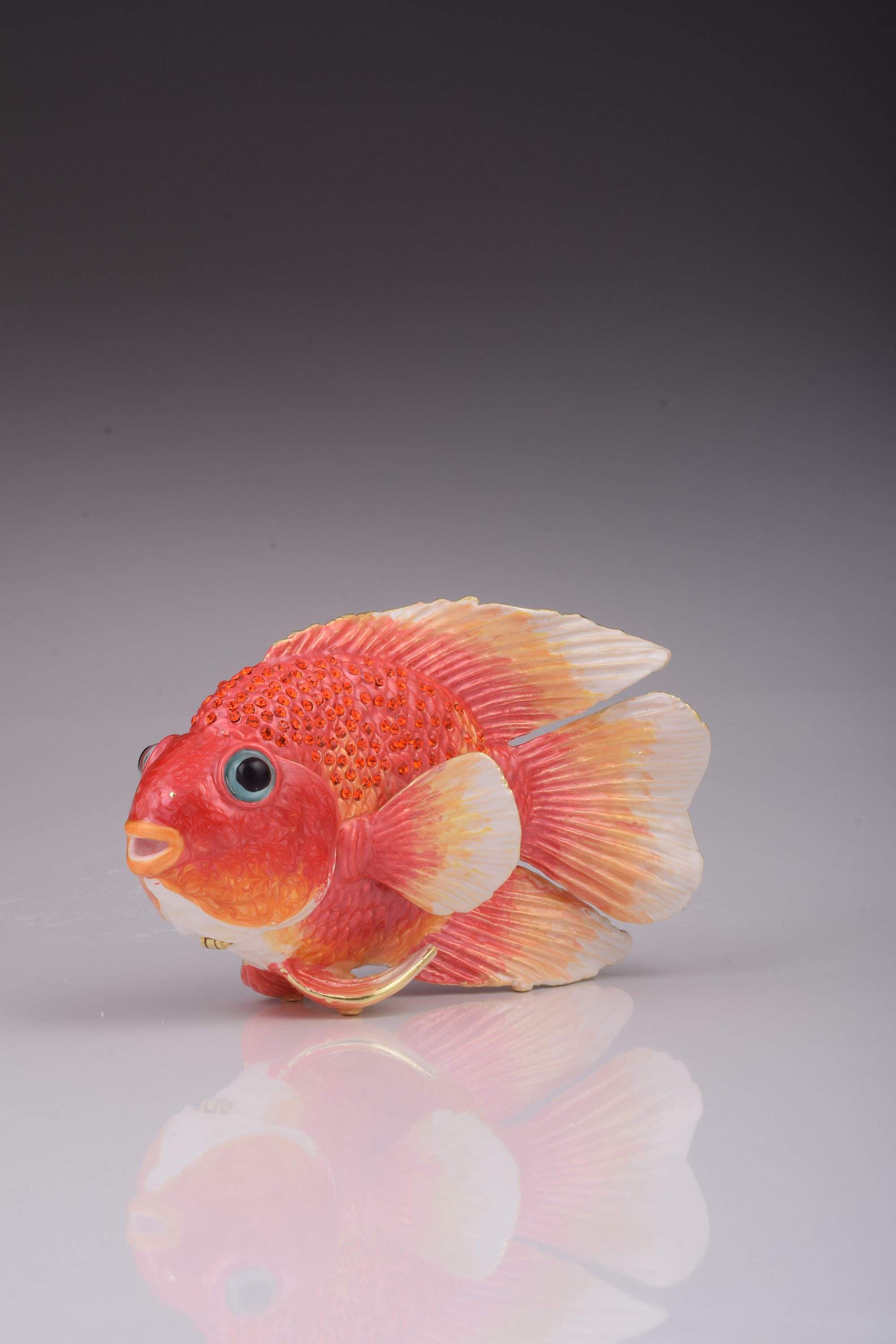 A beautifully handcrafted red fish trinket box adorned with blue Austrian crystals and 925 silver plating, showcasing intricate details.