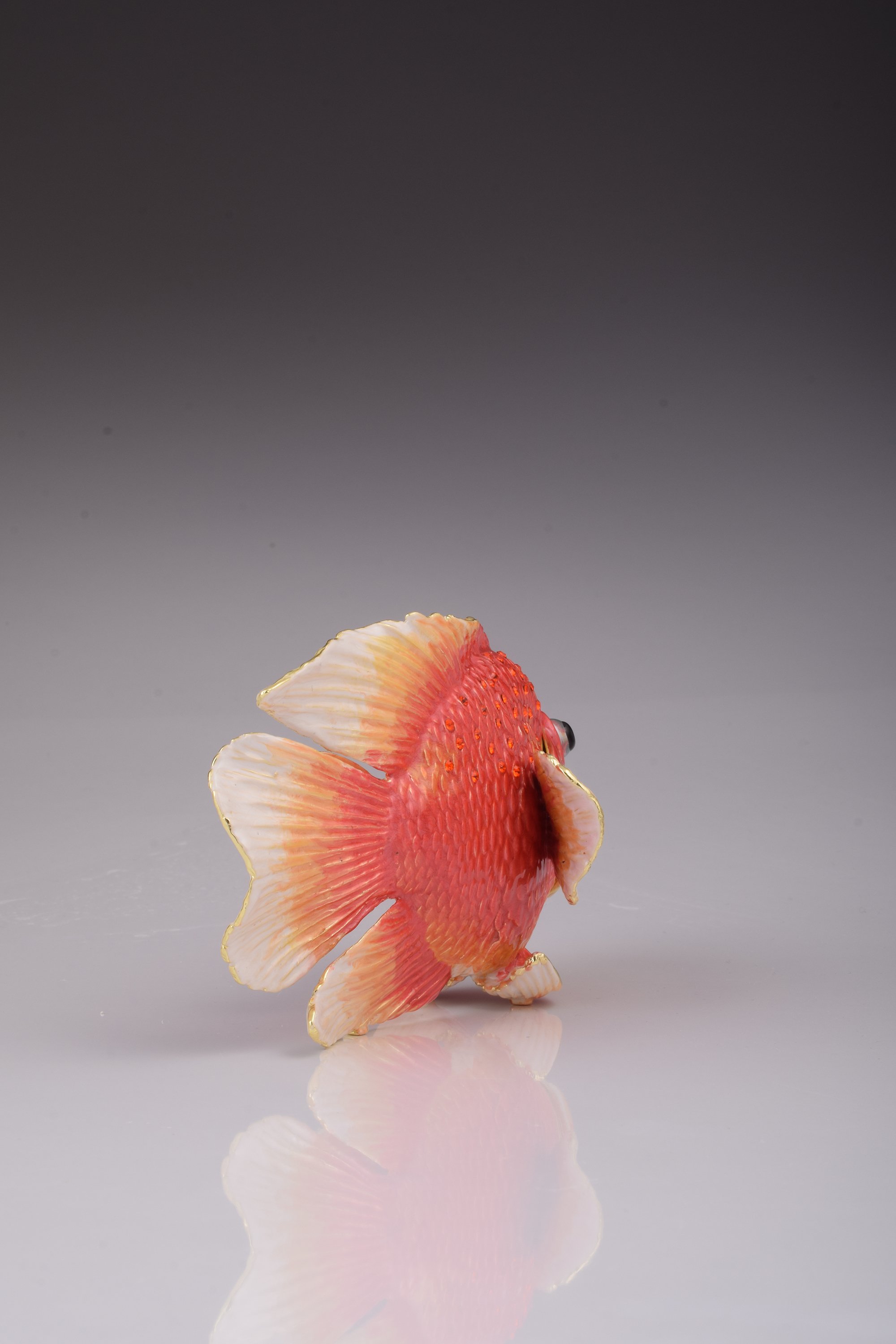 A beautifully handcrafted red fish trinket box adorned with blue Austrian crystals and 925 silver plating, showcasing intricate details.