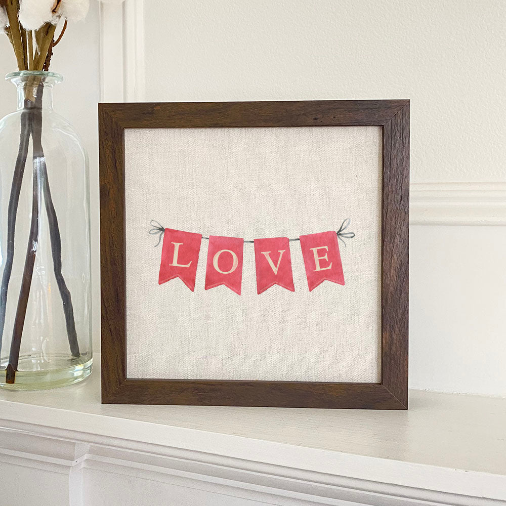 Red Love Banner framed sign with a stylized wood frame, featuring eco-friendly printing on a linen-look background.