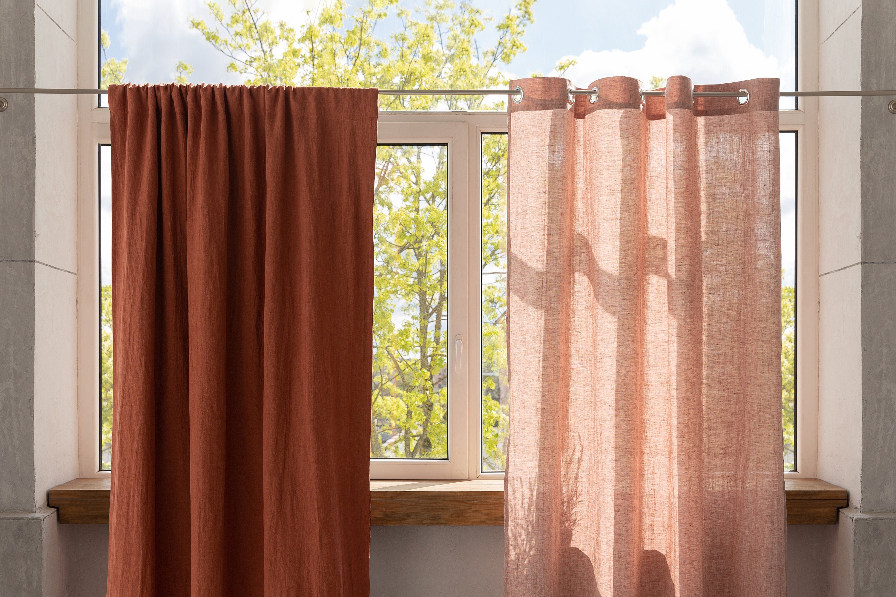Reddish brown linen curtain with blackout feature, elegantly draped with a rod pocket for easy hanging.