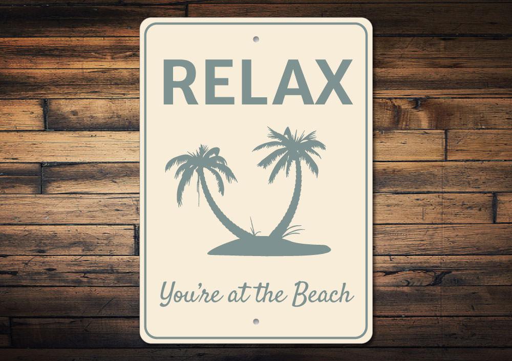 Relax Beach Sign made of high-quality aluminum, featuring a coastal design perfect for beach houses and outdoor decor.