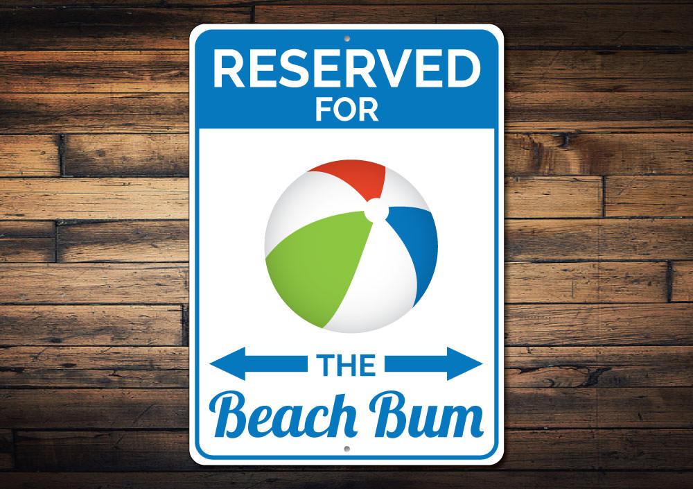 Reserved Beach Bum Parking Sign made of durable aluminum, featuring a beach-themed design, perfect for marking your parking spot.