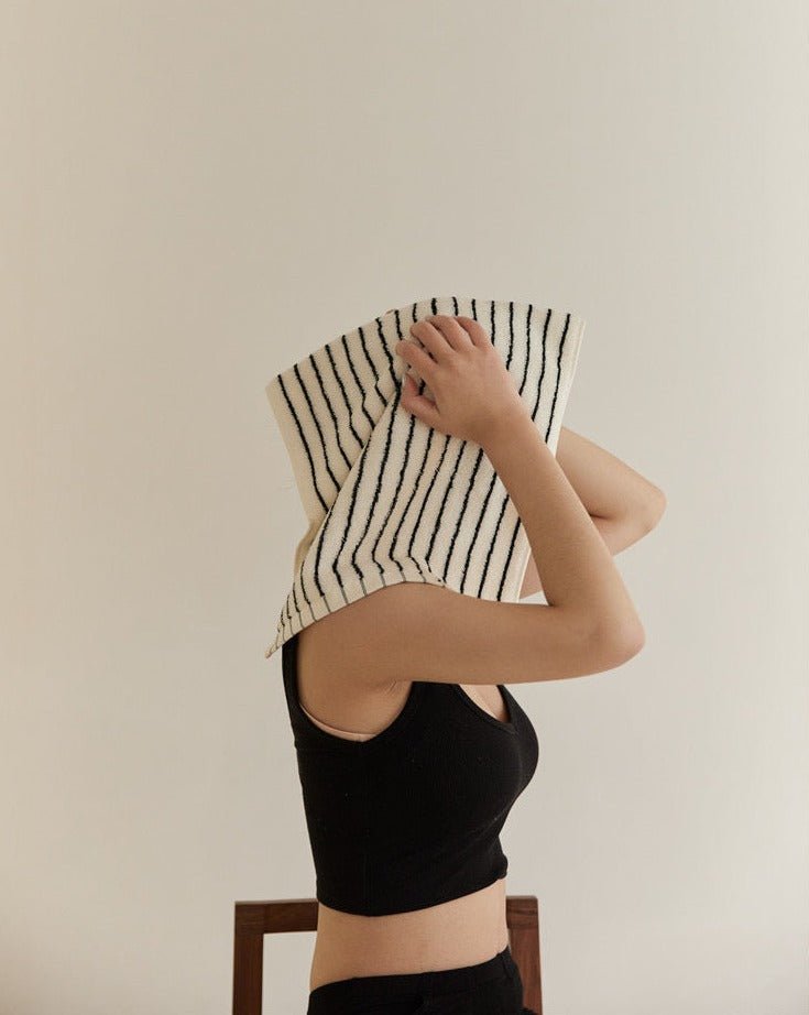 A luxurious Retro Style 100% Organic Combed Cotton Striped Bath Towel, showcasing its soft texture and vibrant striped design.