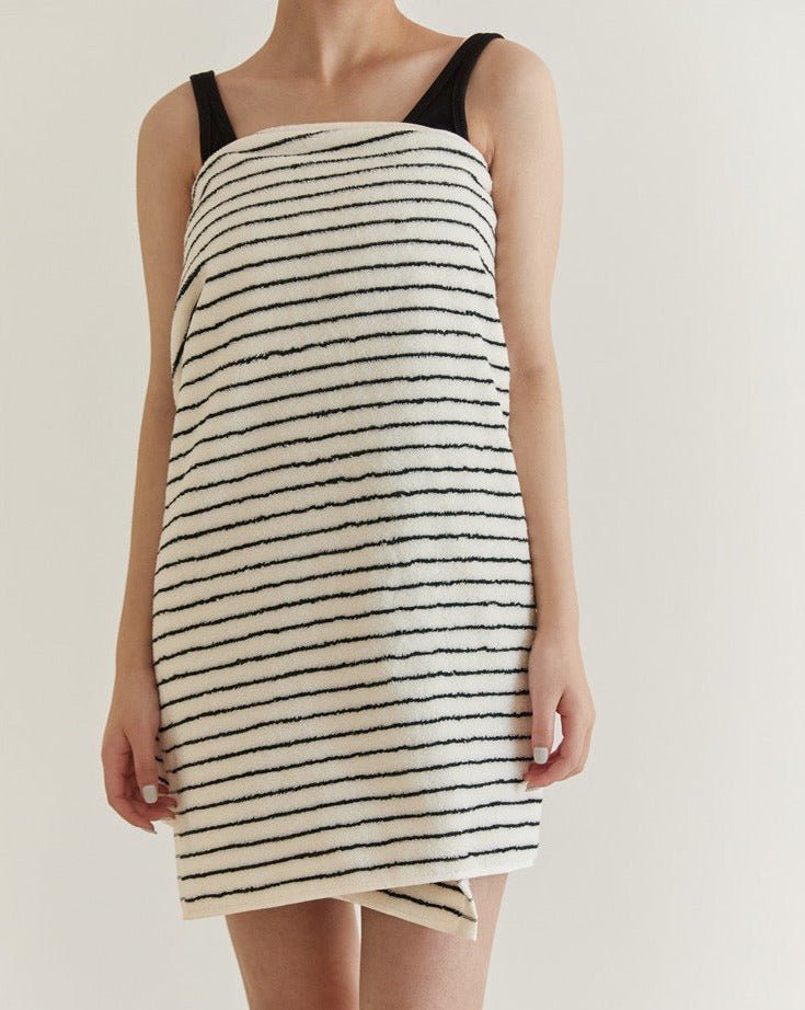 A luxurious Retro Style 100% Organic Combed Cotton Striped Bath Towel, showcasing its soft texture and vibrant striped design.