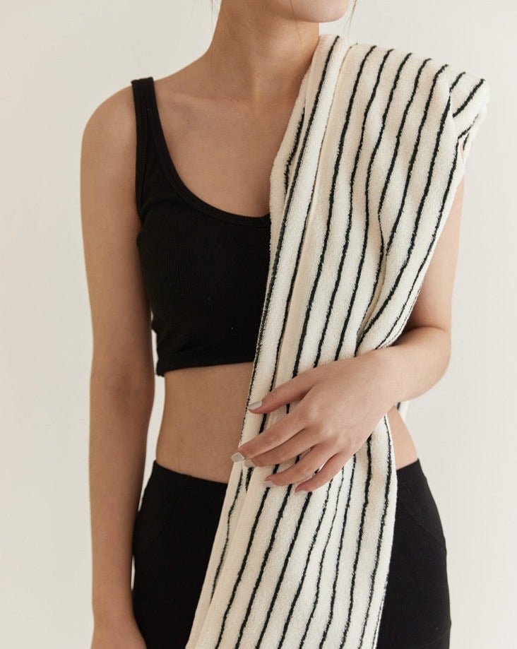 A luxurious Retro Style 100% Organic Combed Cotton Striped Bath Towel, showcasing its soft texture and vibrant striped design.