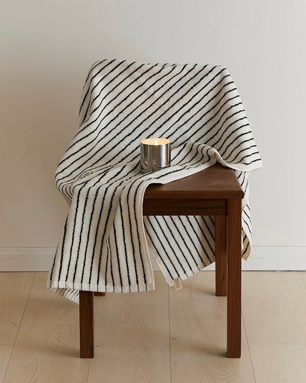 A luxurious Retro Style 100% Organic Combed Cotton Striped Bath Towel, showcasing its soft texture and vibrant striped design.