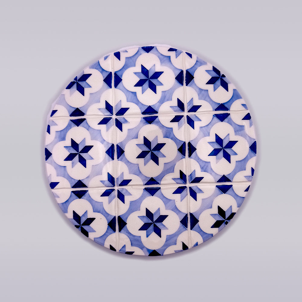 Rossio Ceramic Trivet featuring intricate hand-painted designs, perfect for protecting surfaces from hot pans.