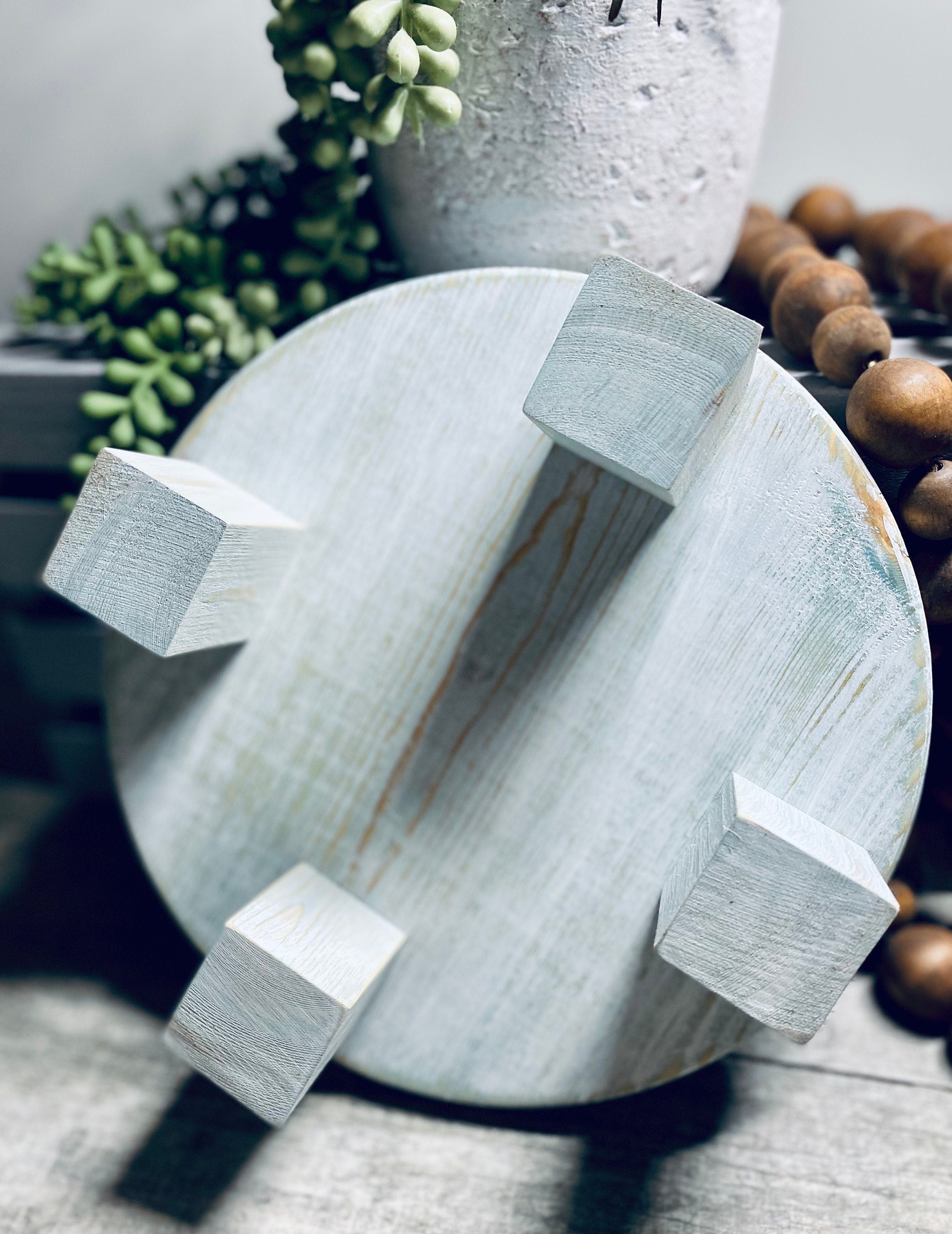 Round Wooden Riser in Vintage Blue with whitewashed finish, showcasing a shabby chic design, perfect for displaying soaps and candles.