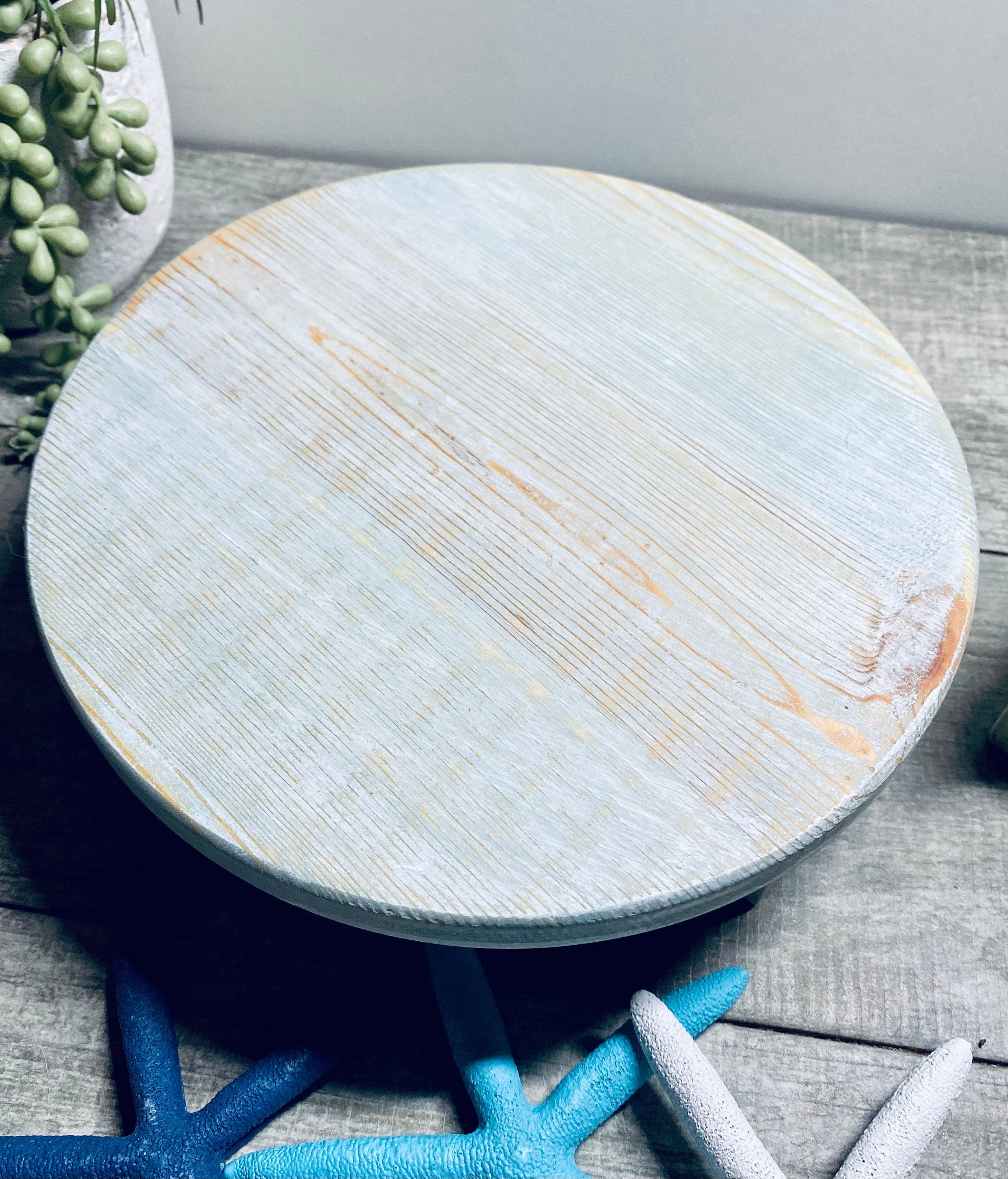 Round Wooden Riser in Vintage Blue with whitewashed finish, showcasing a shabby chic design, perfect for displaying soaps and candles.