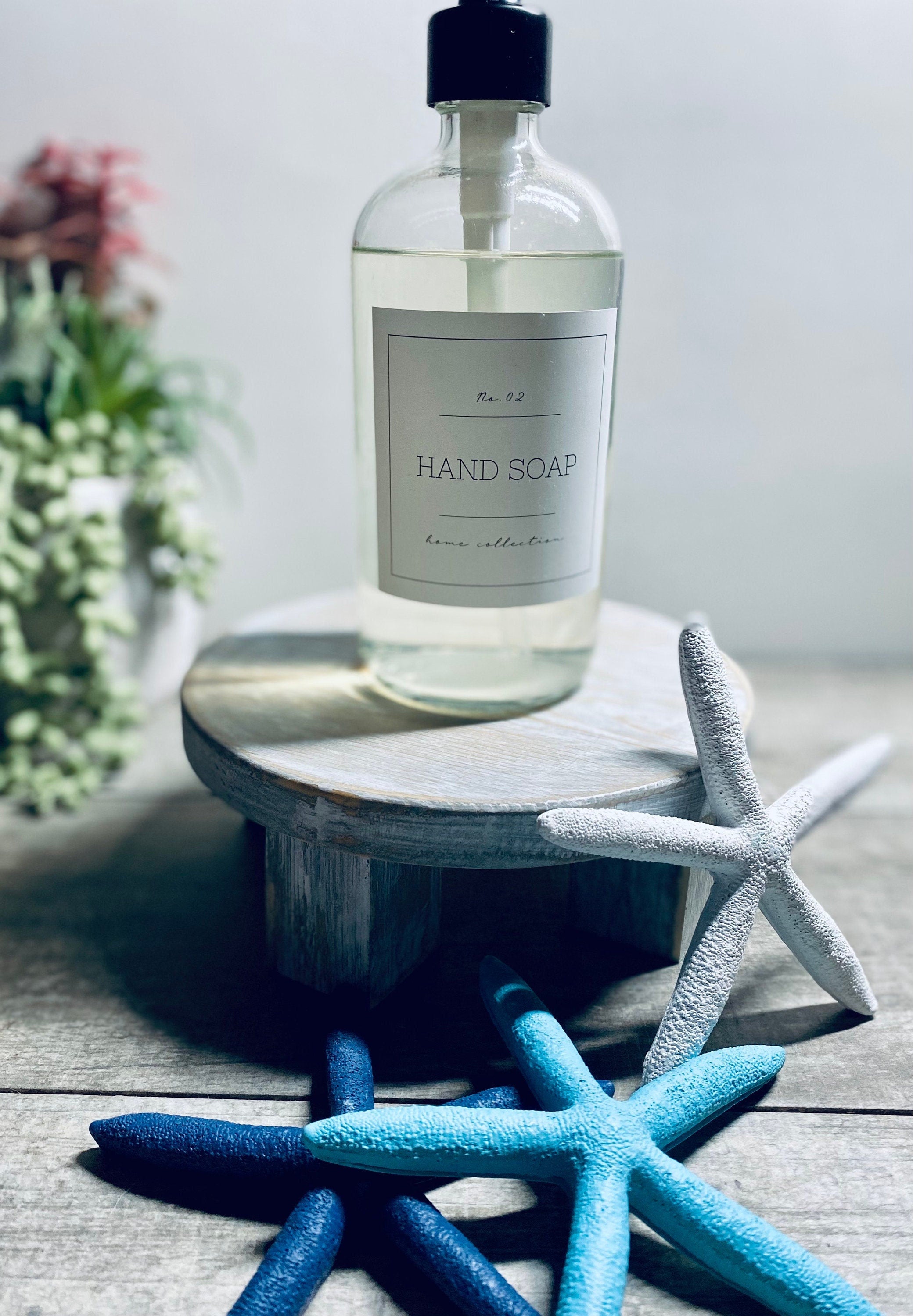 Round wooden riser in Classic Gray with a whitewashed finish, showcasing its rustic charm and sturdy design, perfect for displaying decor items.