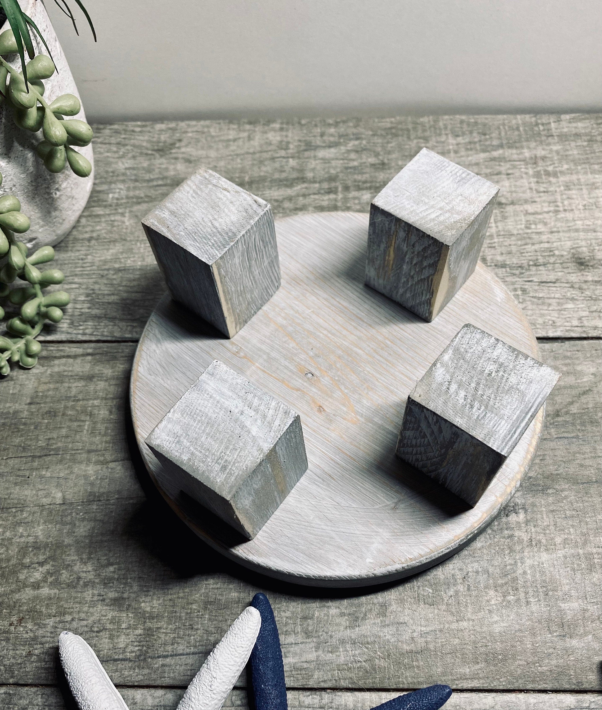 Round wooden riser in Classic Gray with a whitewashed finish, showcasing its rustic charm and sturdy design, perfect for displaying decor items.