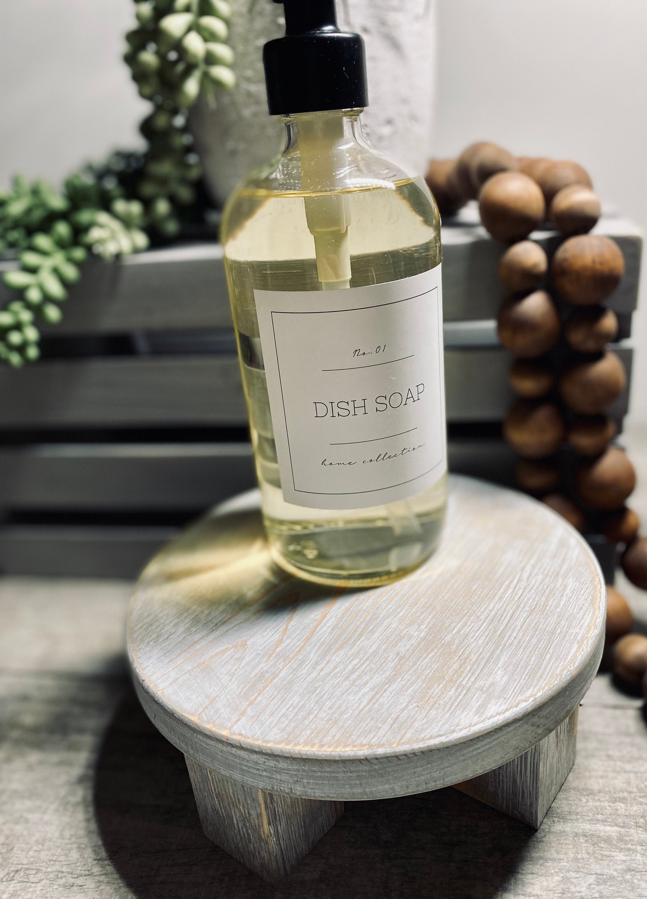 Round wooden riser in Classic Gray with a whitewashed finish, showcasing its rustic charm and sturdy design, perfect for displaying decor items.