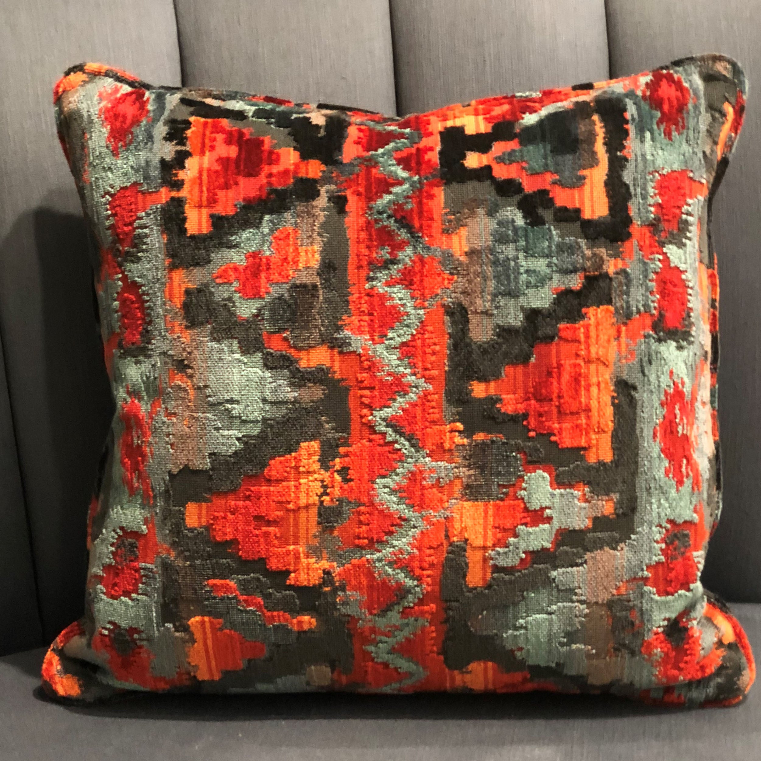 Sachi Love Red, Blue and Orange iKat Luxury Throw Pillow showcasing vibrant colors and intricate ikat pattern, perfect for home decor.