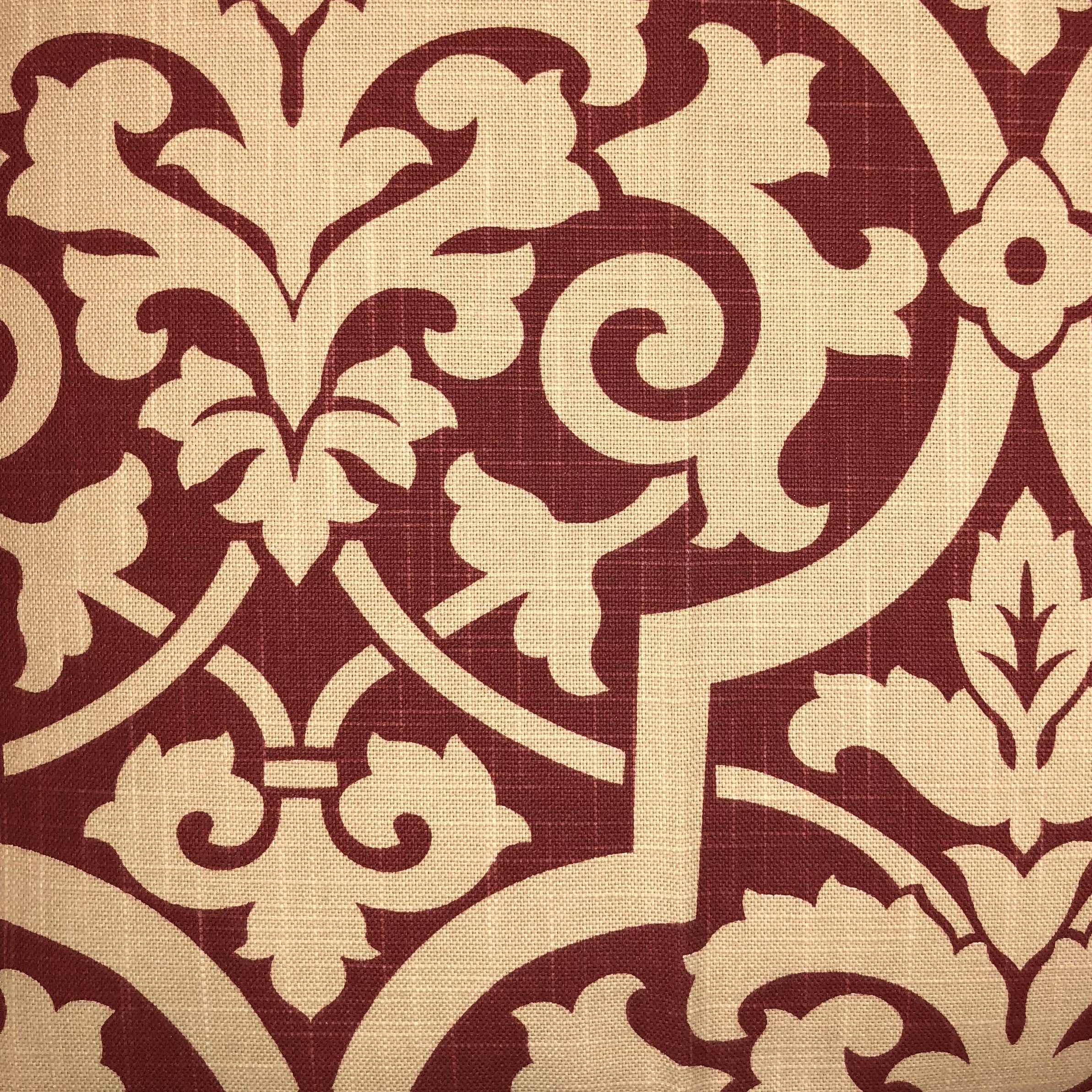 Sacred Shield Red and Beige Luxury Throw Pillow featuring a geometric pattern, handmade in the USA with a cotton blend fabric.