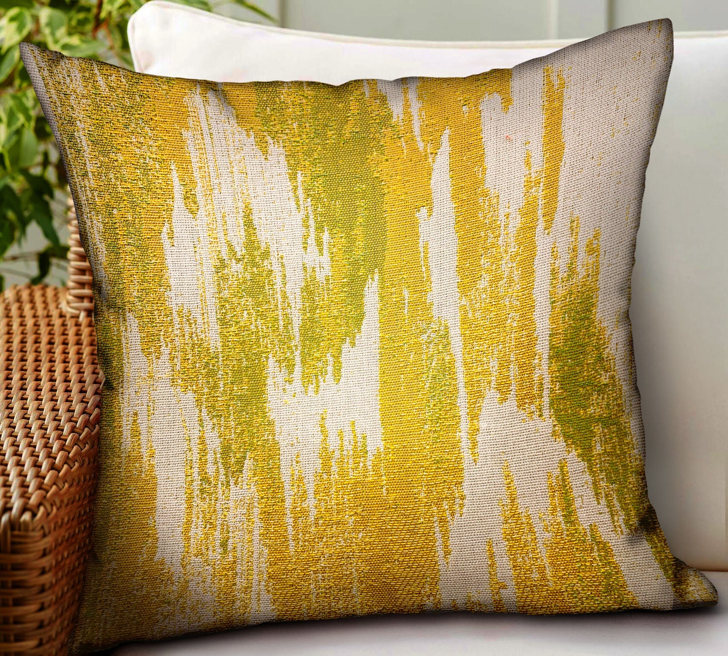 Saffron Love Yellow Ikat Luxury Throw Pillow featuring a vibrant yellow color and elegant Ikat pattern, perfect for indoor and outdoor use.