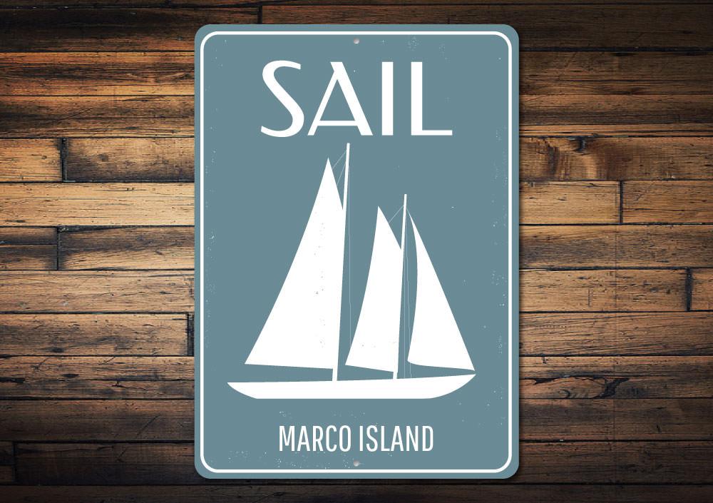 Customizable Sail Sign made of high-quality aluminum, featuring a beach-themed design, perfect for coastal decor.