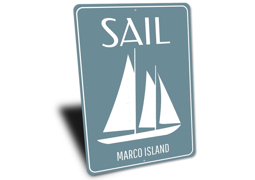 Customizable Sail Sign made of high-quality aluminum, featuring a beach-themed design, perfect for coastal decor.