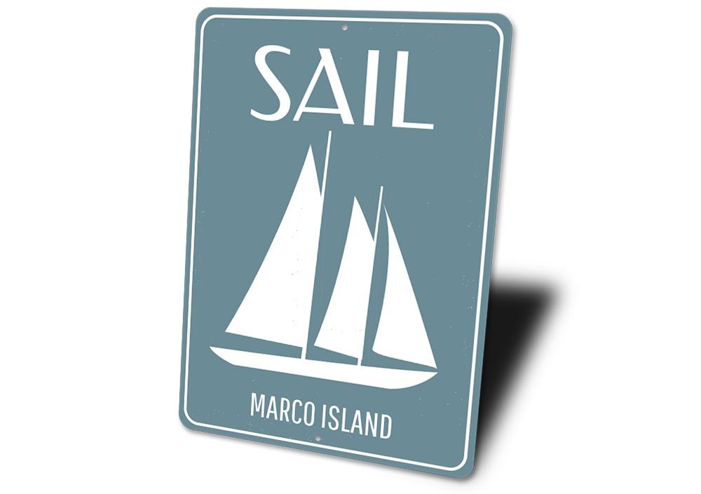 Customizable Sail Sign made of high-quality aluminum, featuring a beach-themed design, perfect for coastal decor.